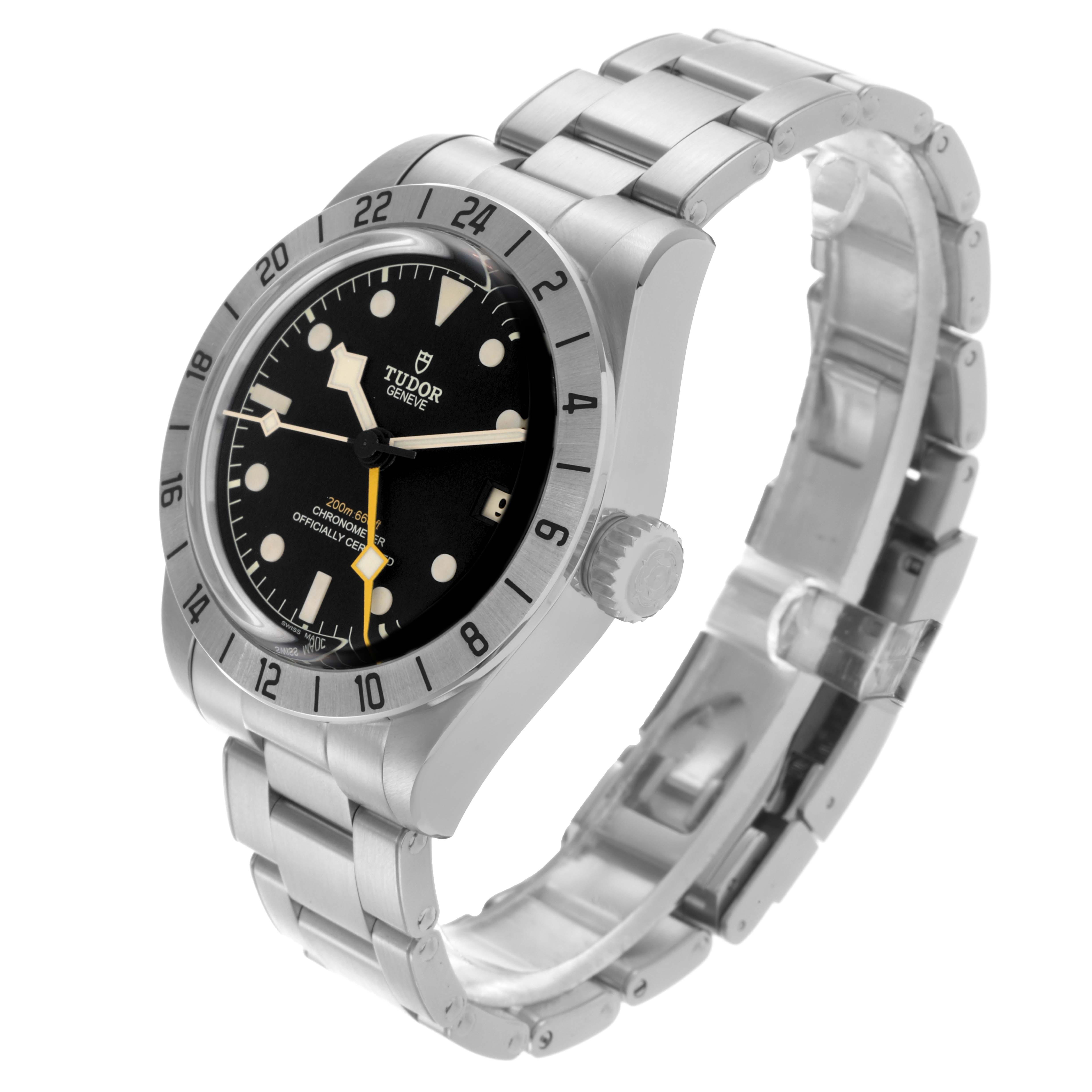 The Tudor Heritage Black Bay 79470 Men's Stainless Steel Black Dial 79470 Men's Stainless Steel Black Dial watch is shown at a three-quarter angle, highlighting the dial, bezel, case, and bracelet.