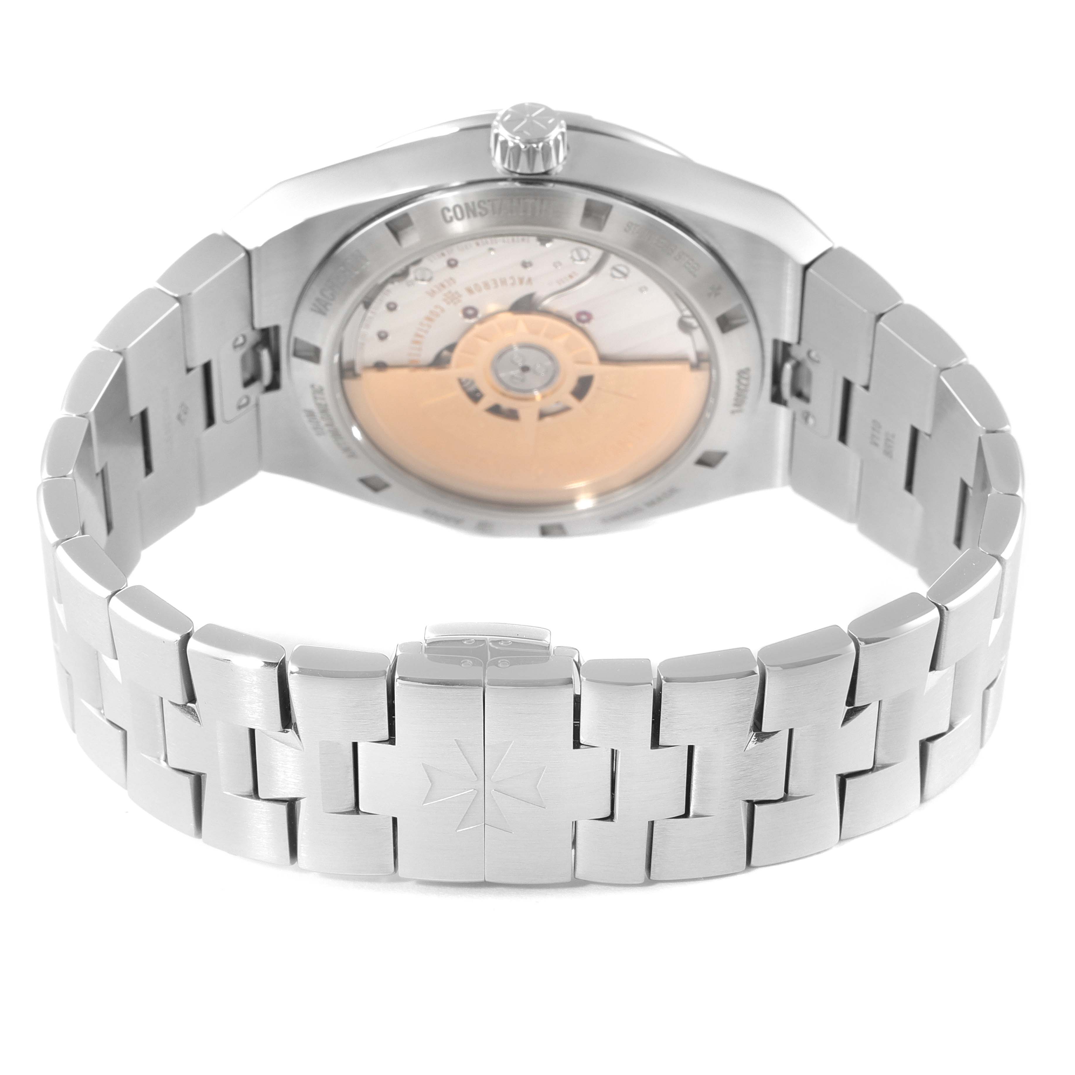 The image shows the back of the Vacheron Constantin Overseas 4500V/110A-B126 Men's Stainless Steel Silver Dial 4500V/110A-B126 Men's Stainless Steel Silver Dial model, highlighting the exhibition case back and intricate bracelet design.