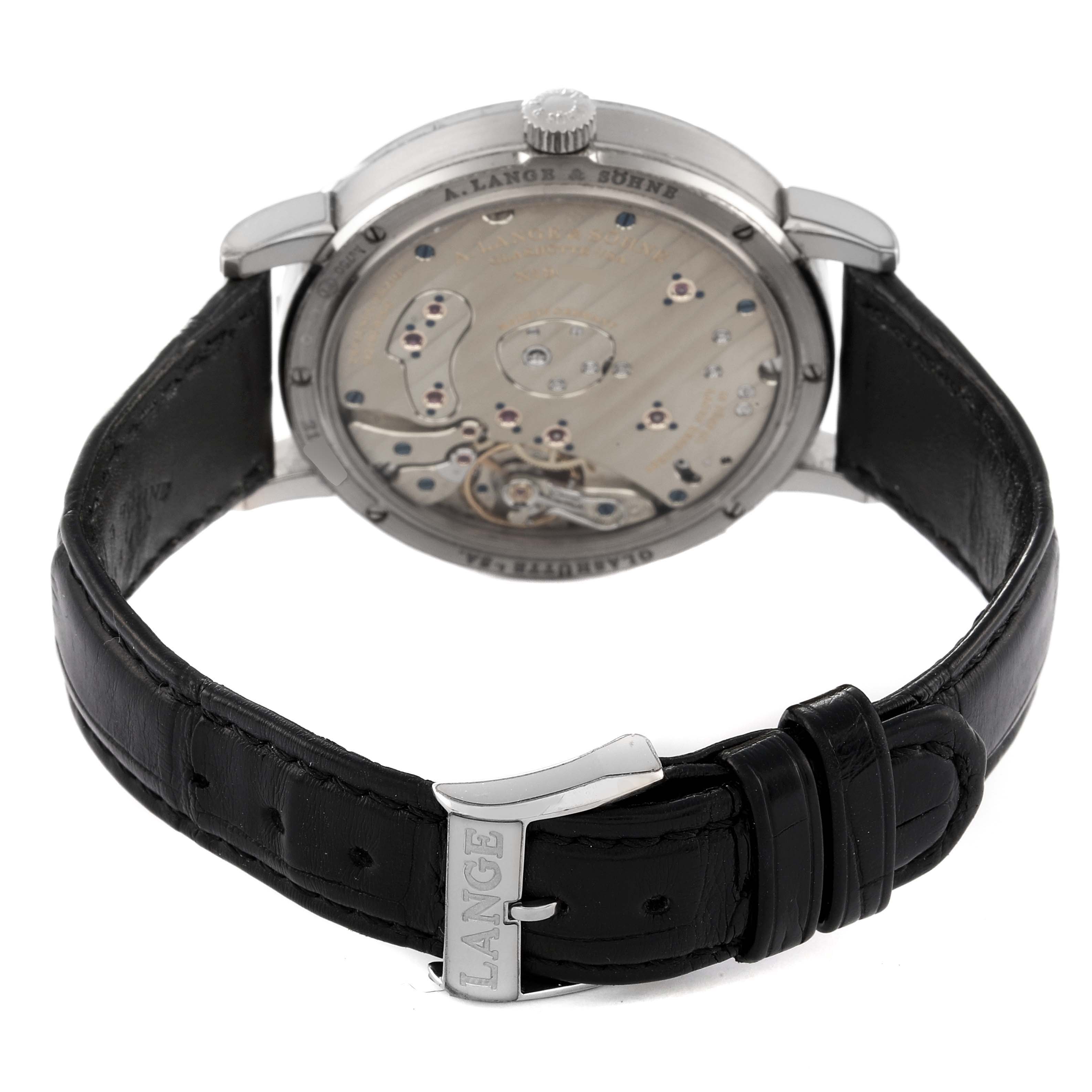 This image shows the back view of the A. Lange & Sohne Richard Lange 117.028 / LSLS1173AD Men's White Gold Black Dial watch, revealing the watch movement and black leather strap.