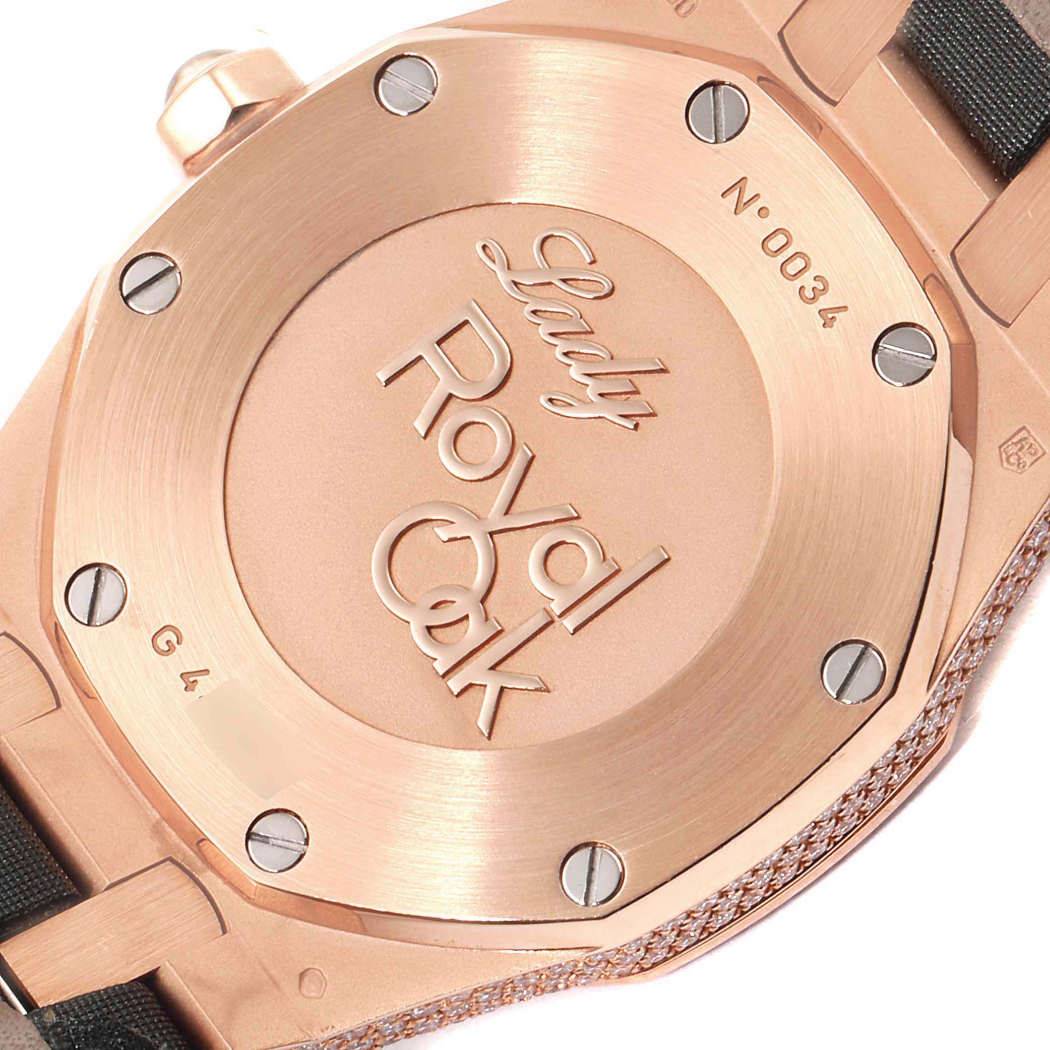 This image shows the caseback of a Lady Royal Oak watch by Audemars Piguet, featuring its distinct screws and engraving.