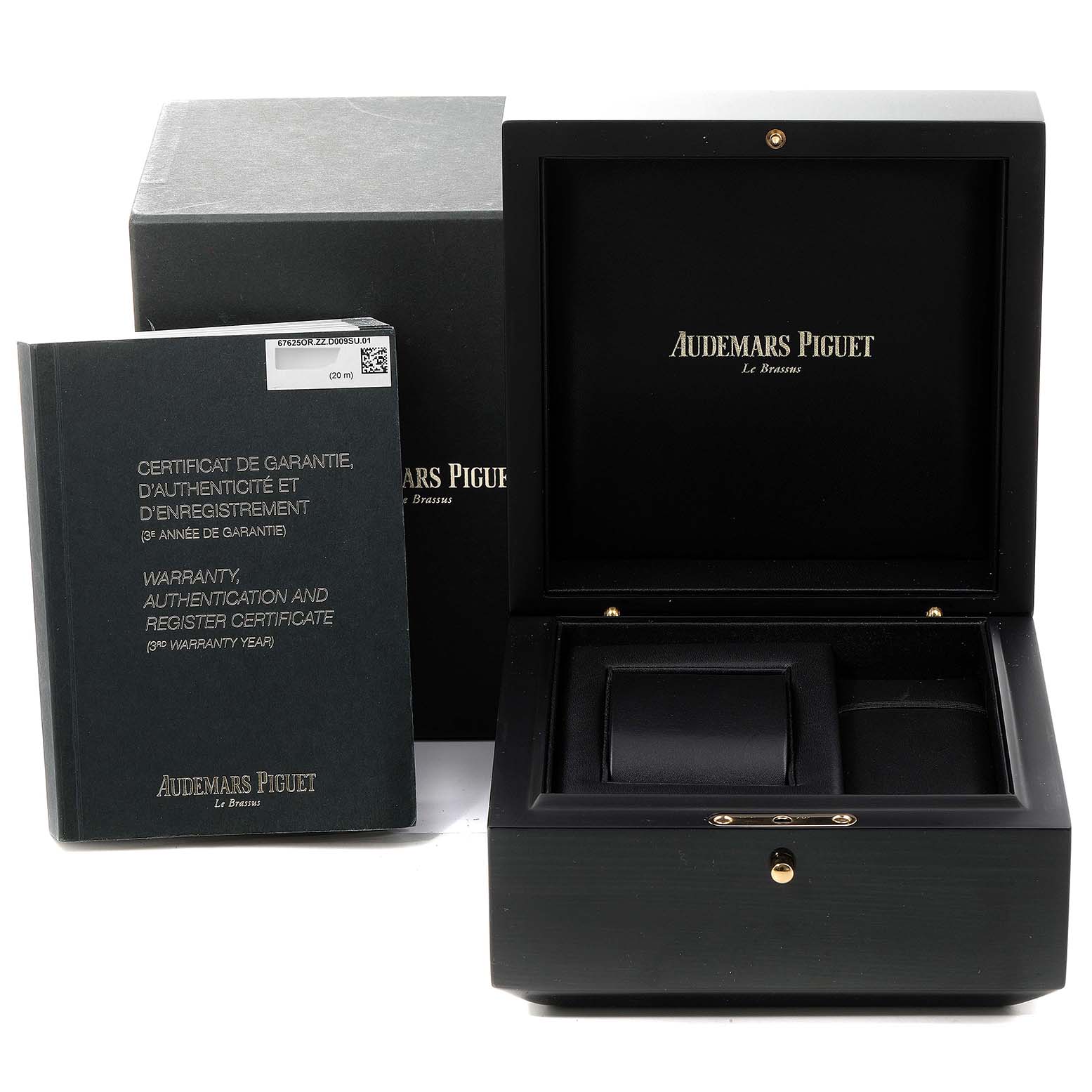 The image displays a Royal Oak Audemars Piguet watch box and warranty booklet from a front angle.