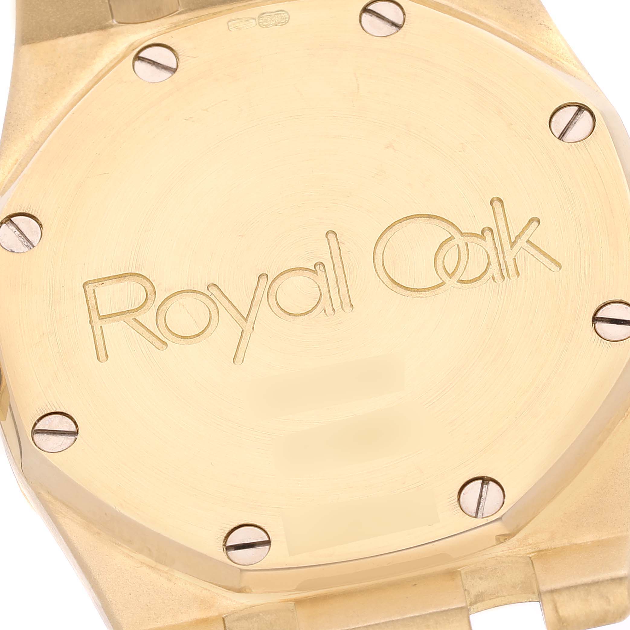 This image shows the back case of a Royal Oak watch by Audemars Piguet, featuring its brand engraving and screws.