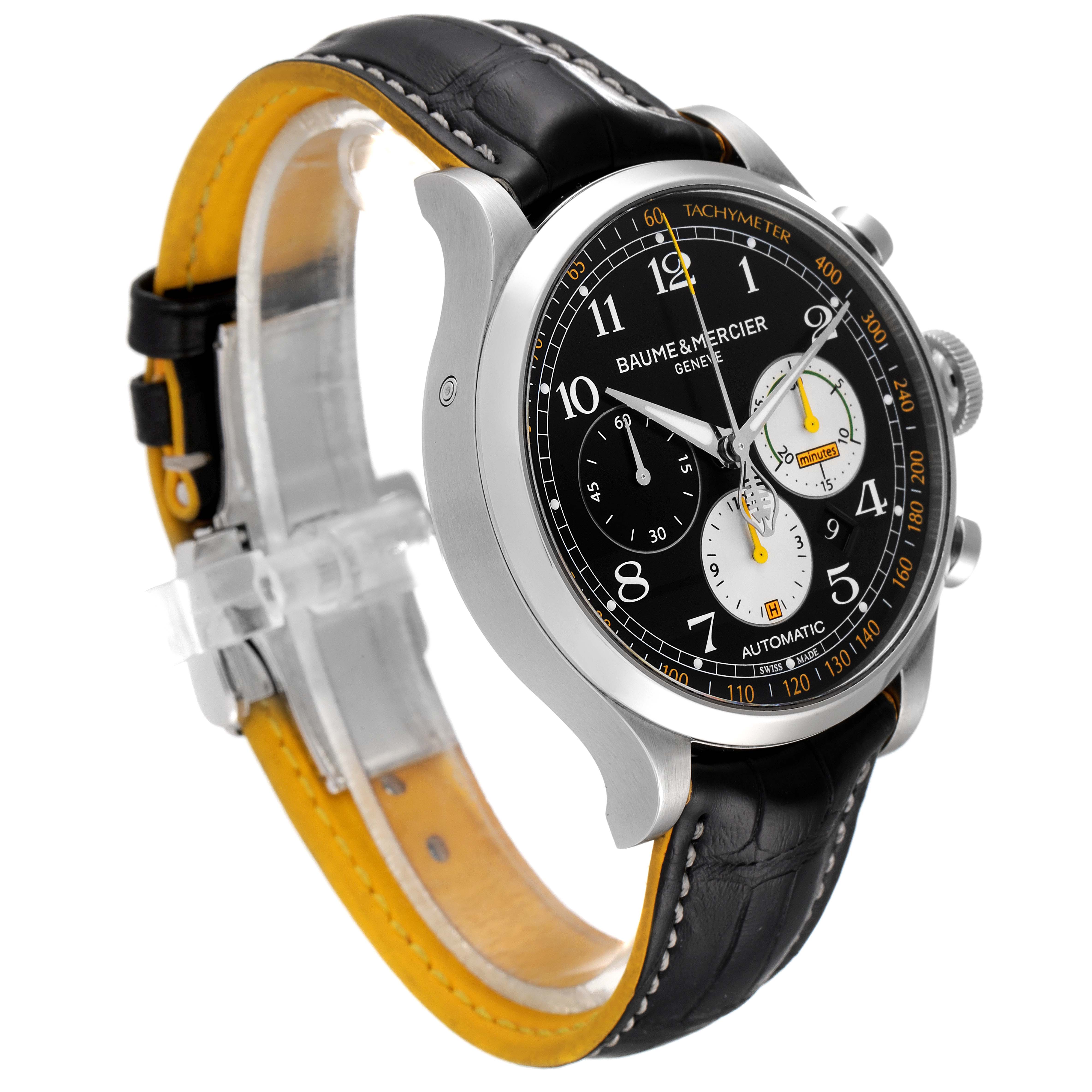 The image shows a Baume & Mercier Capeland 65798 Men's Stainless Steel Black Dial 65798 Men's Stainless Steel Black Dial watch at a three-quarter angle, highlighting the face, bezel, crown, and part of the leather strap.