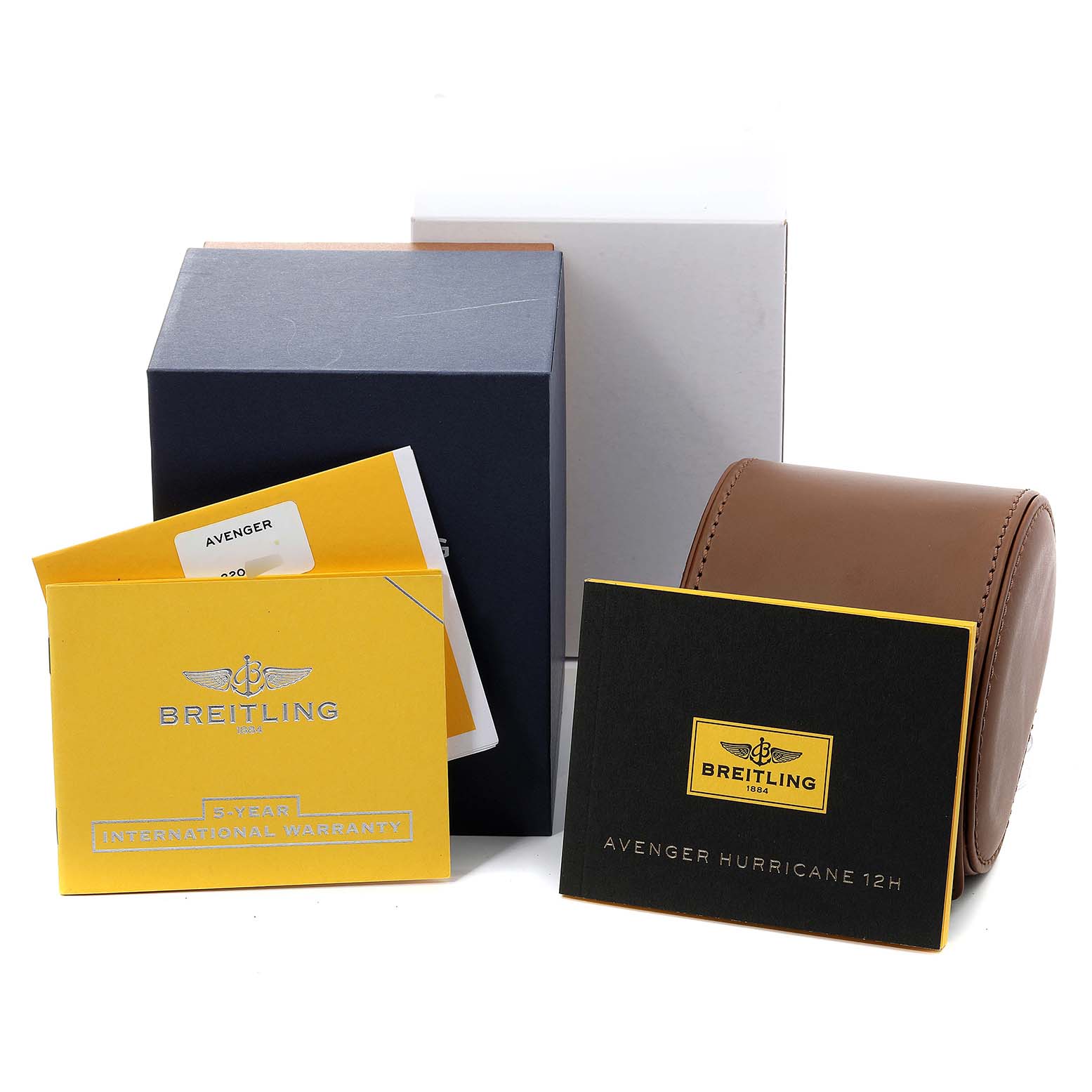The image shows Breitling Avenger XB0170E4/1533 Men's Titanium Yellow Dial XB0170E4/1533 Men's Titanium Yellow Dial watch accessories including warranty cards, a black box, a brown case, and documents.