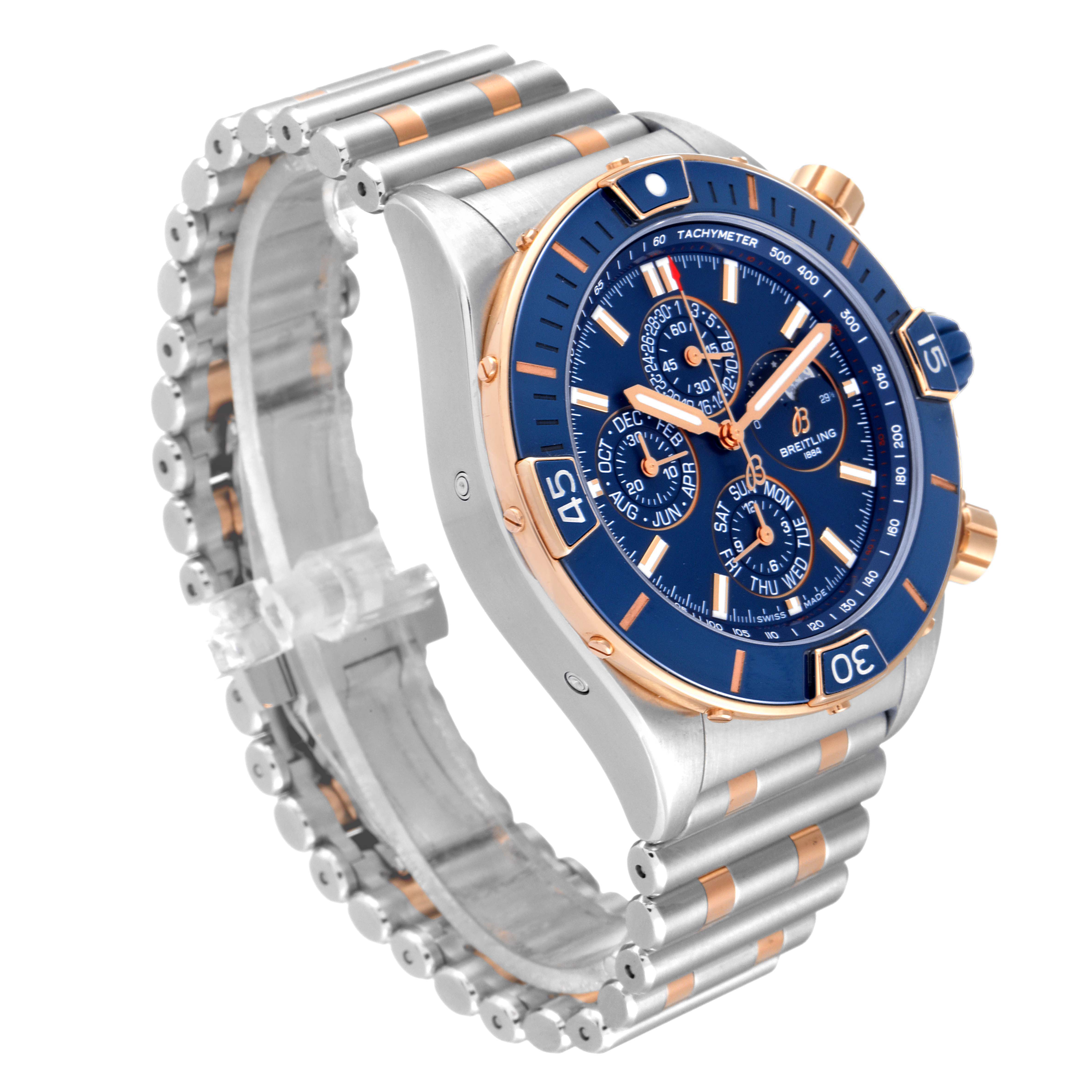 The image shows a Breitling Chronomat U19320161C1U1 Men's Steel and Gold (two tone) Blue Dial U19320161C1U1 Men's Steel and Gold (two tone) Blue Dial watch at a three-quarter angle, highlighting its blue dial, gold-toned accents, and stainless steel bracelet.