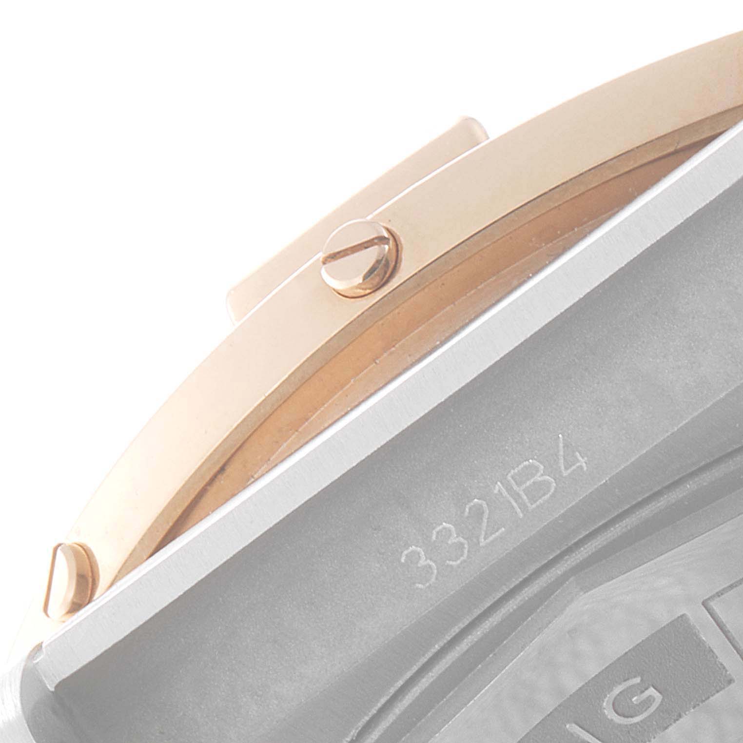 The image shows a close-up of the side of a Breitling Chronomat U19320161C1U1 Men's Steel and Gold (two tone) Blue Dial U19320161C1U1 Men's Steel and Gold (two tone) Blue Dial watch case, highlighting the bezel and screws.