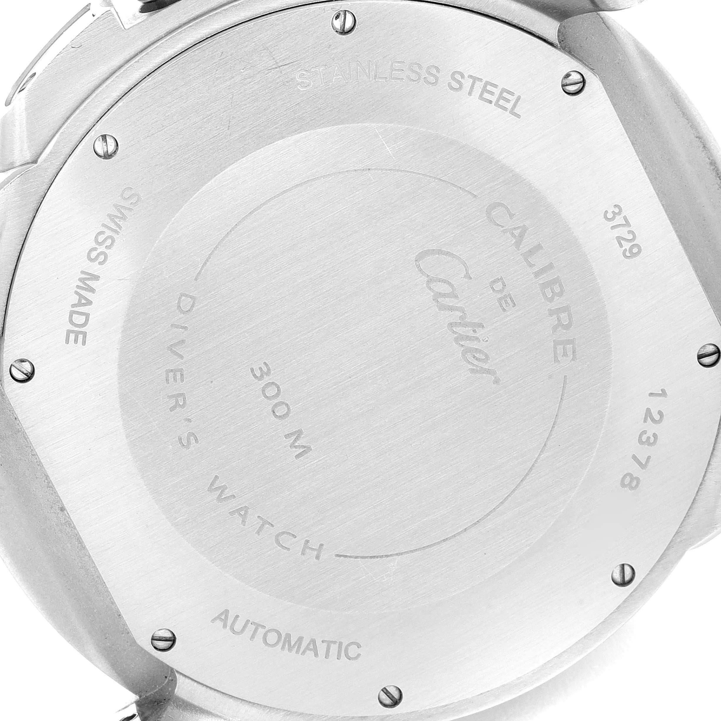 The image shows the stainless steel back casing of a Calibre de Cartier diver
s watch by Cartier.