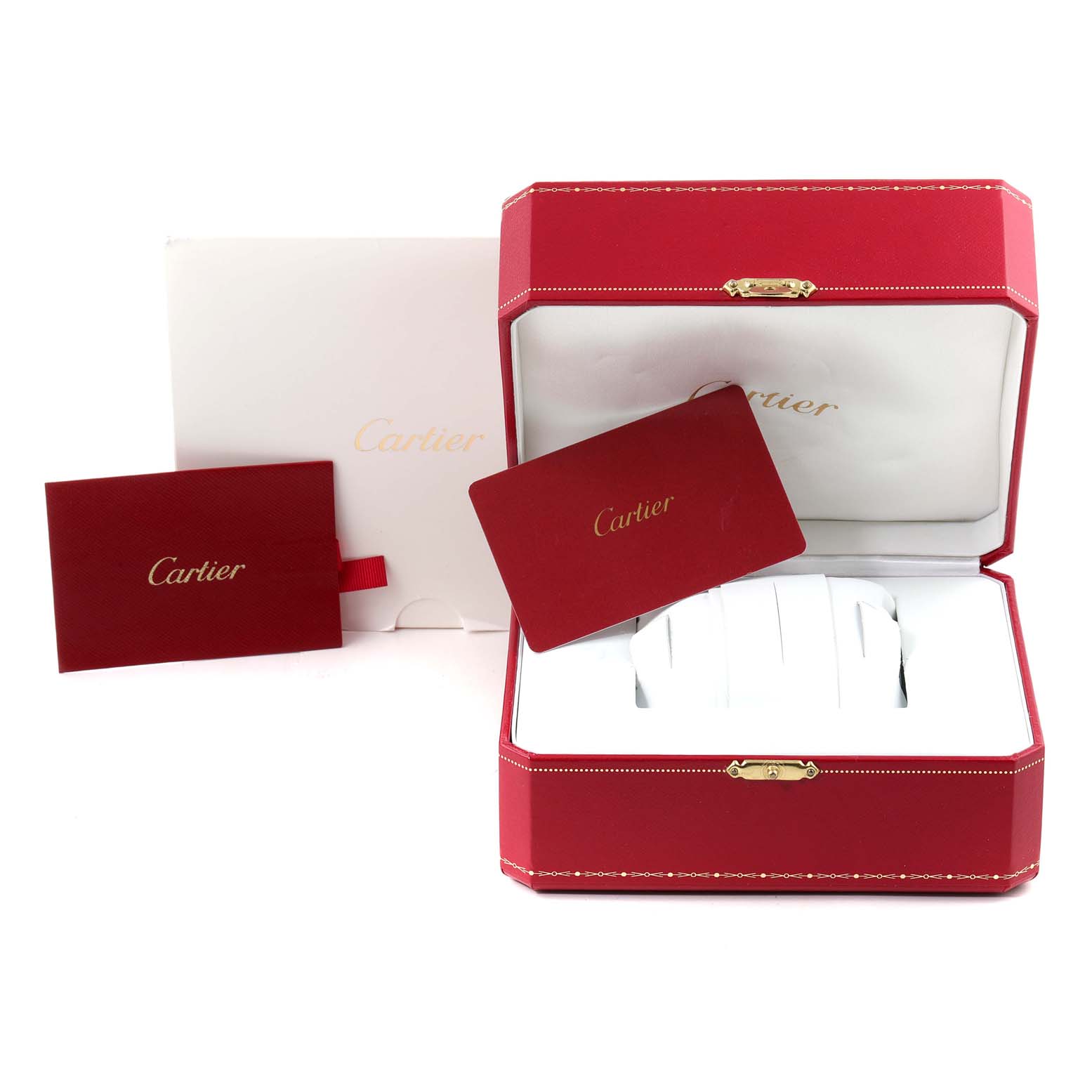 The image shows the packaging for a Calibre de Cartier watch by Cartier, including a red box, warranty card, and pillow.