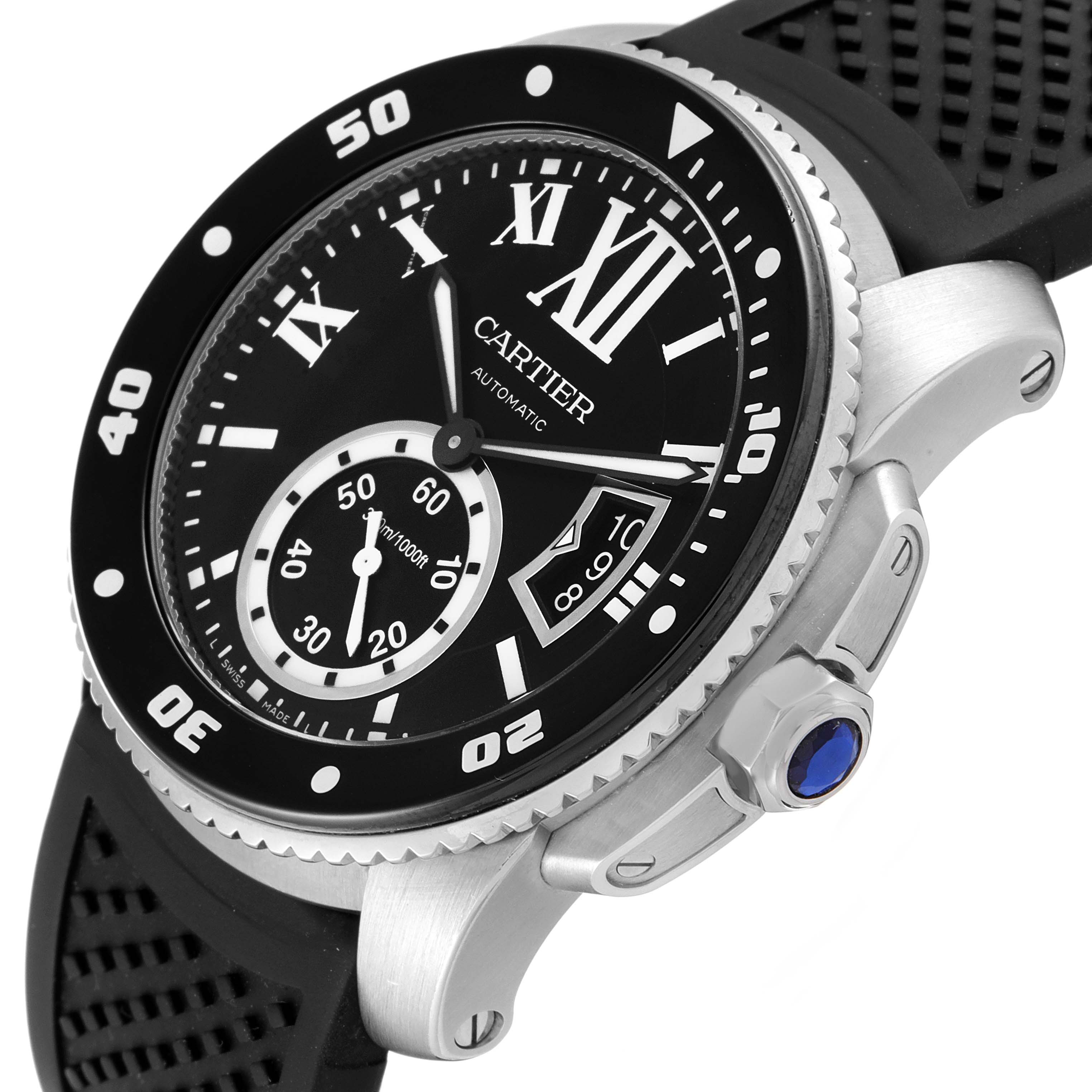 The image shows a Calibre de Cartier watch by Cartier at an angle showcasing the bezel, dial, crown, and part of the strap.