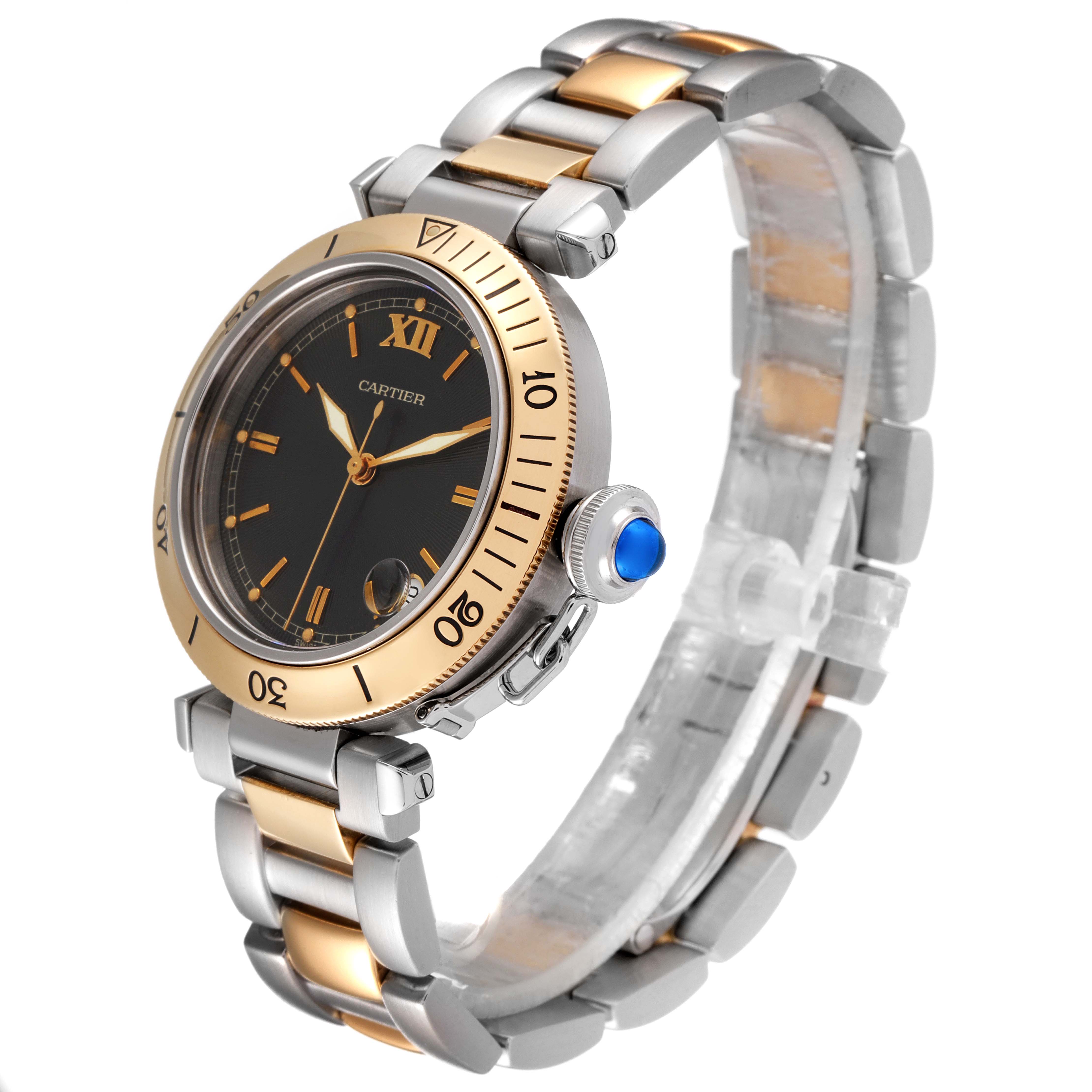 This image shows a Cartier Pasha W31016N1 Men
s Steel and Gold (two tone) Grey Dial W31016N1 Men
s Steel and Gold (two tone) Grey Dial watch at a three-quarter angle, emphasizing its gold bezel, black dial, and two-tone bracelet.
