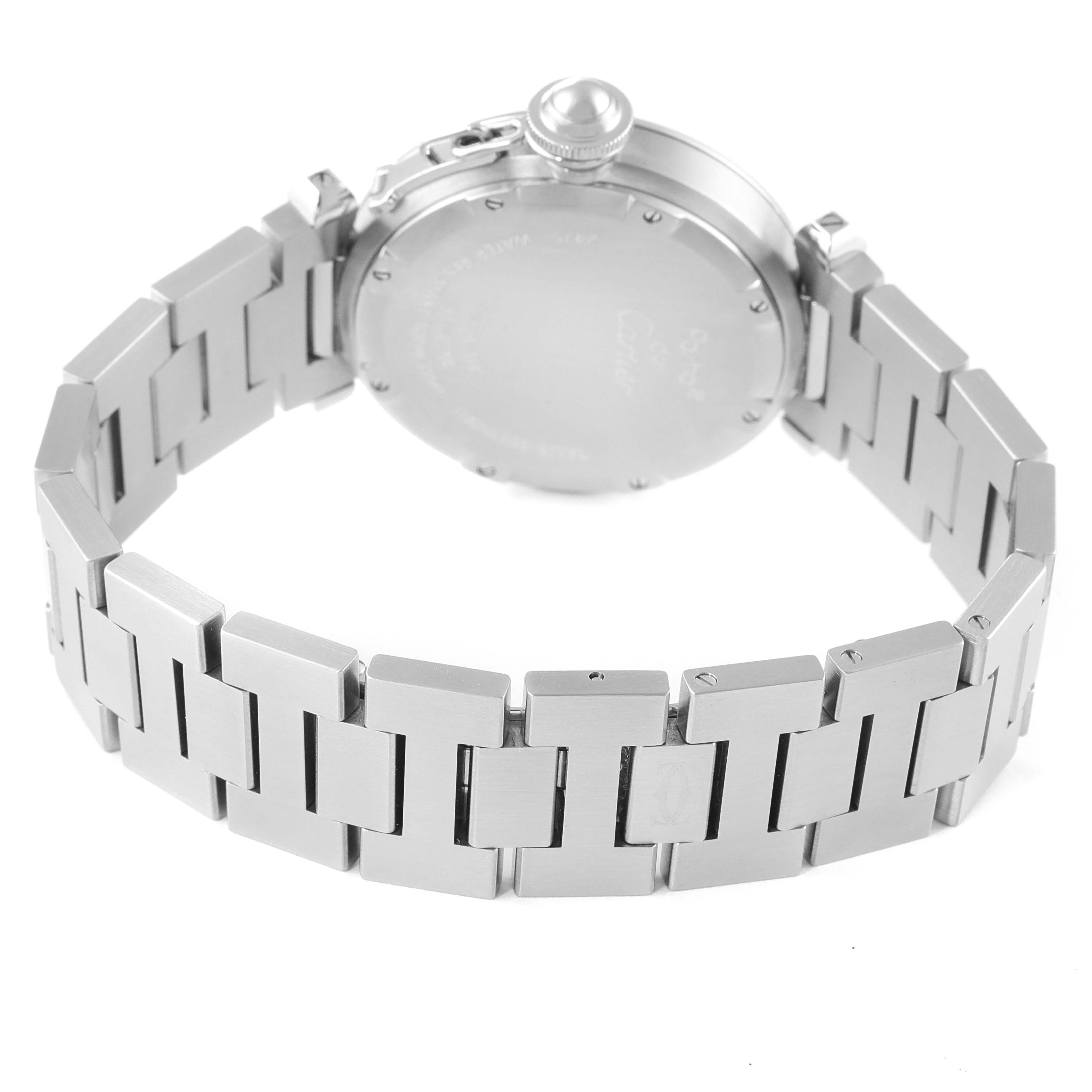 The image shows the back view of a Cartier Pasha W31058M7 Women's Stainless Steel Pink Dial W31058M7 Women's Stainless Steel Pink Dial watch, highlighting its metal bracelet and case back.