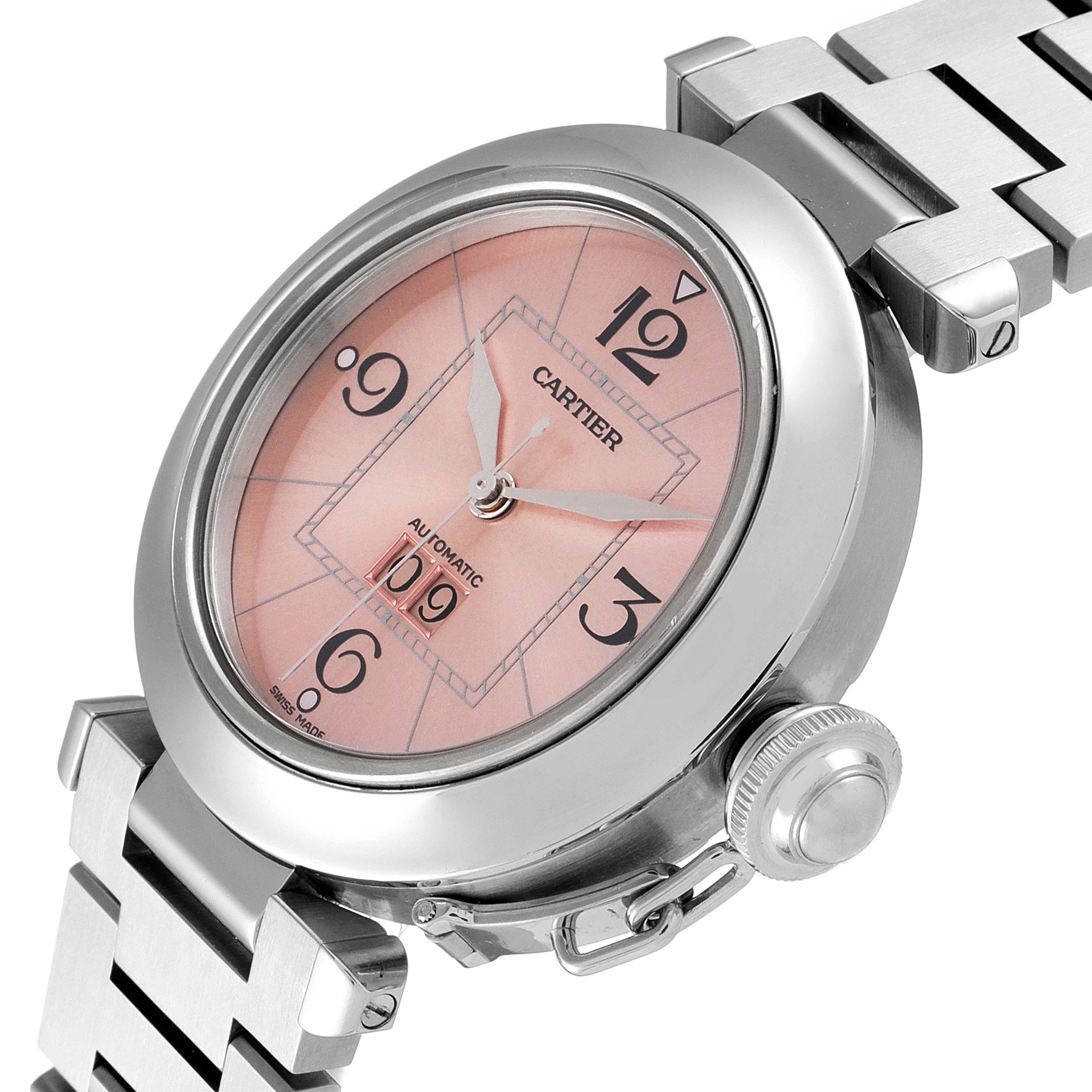 The image shows a Cartier Pasha W31058M7 Women's Stainless Steel Pink Dial W31058M7 Women's Stainless Steel Pink Dial watch at an angle highlighting its pink dial, silver case, crown, and metal bracelet.