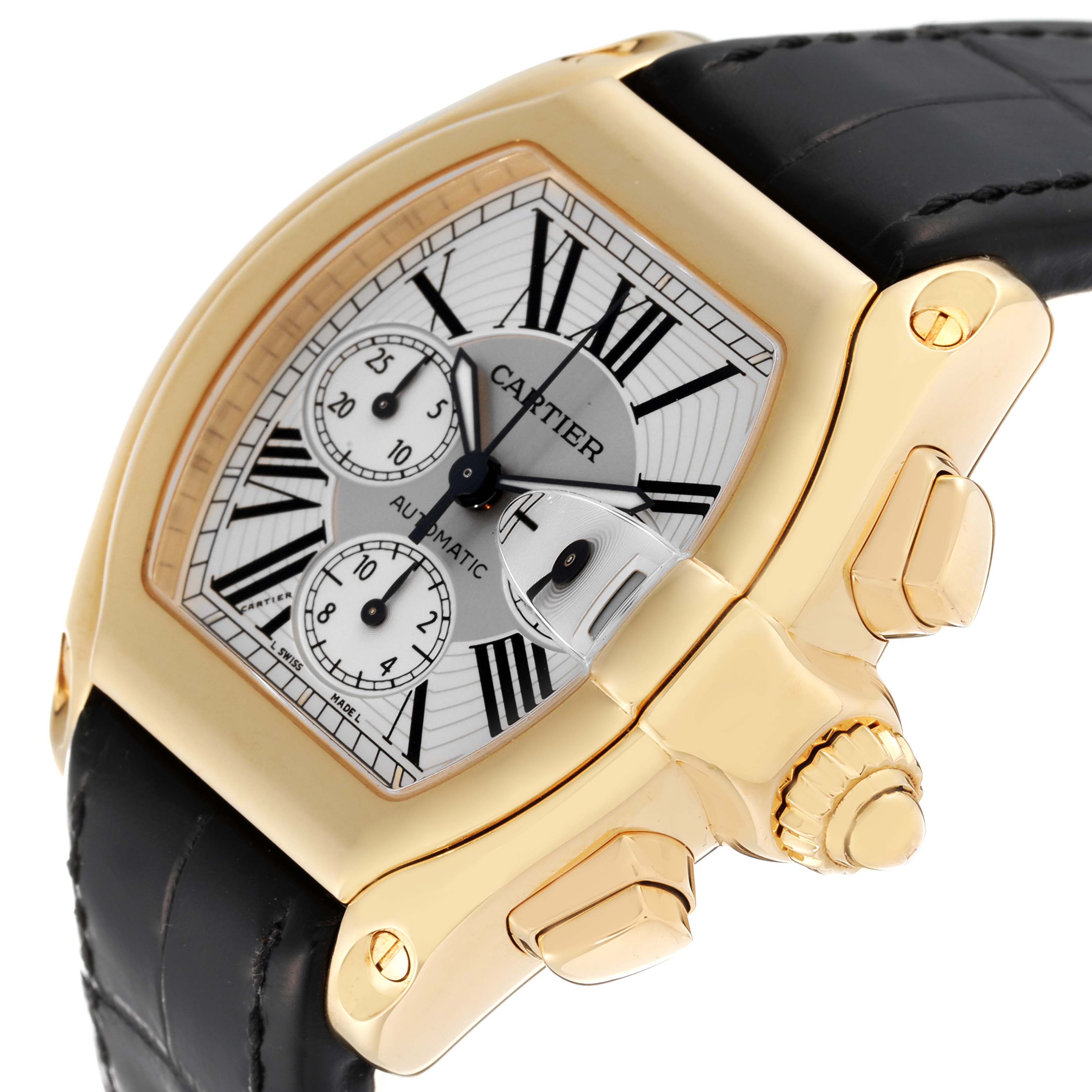 The image shows a close-up of the Cartier Roadster W62021Y3 Men's Yellow Gold Silver Dial W62021Y3 Men's Yellow Gold Silver Dial watch highlighting the face, crown, and pushers at an angle.