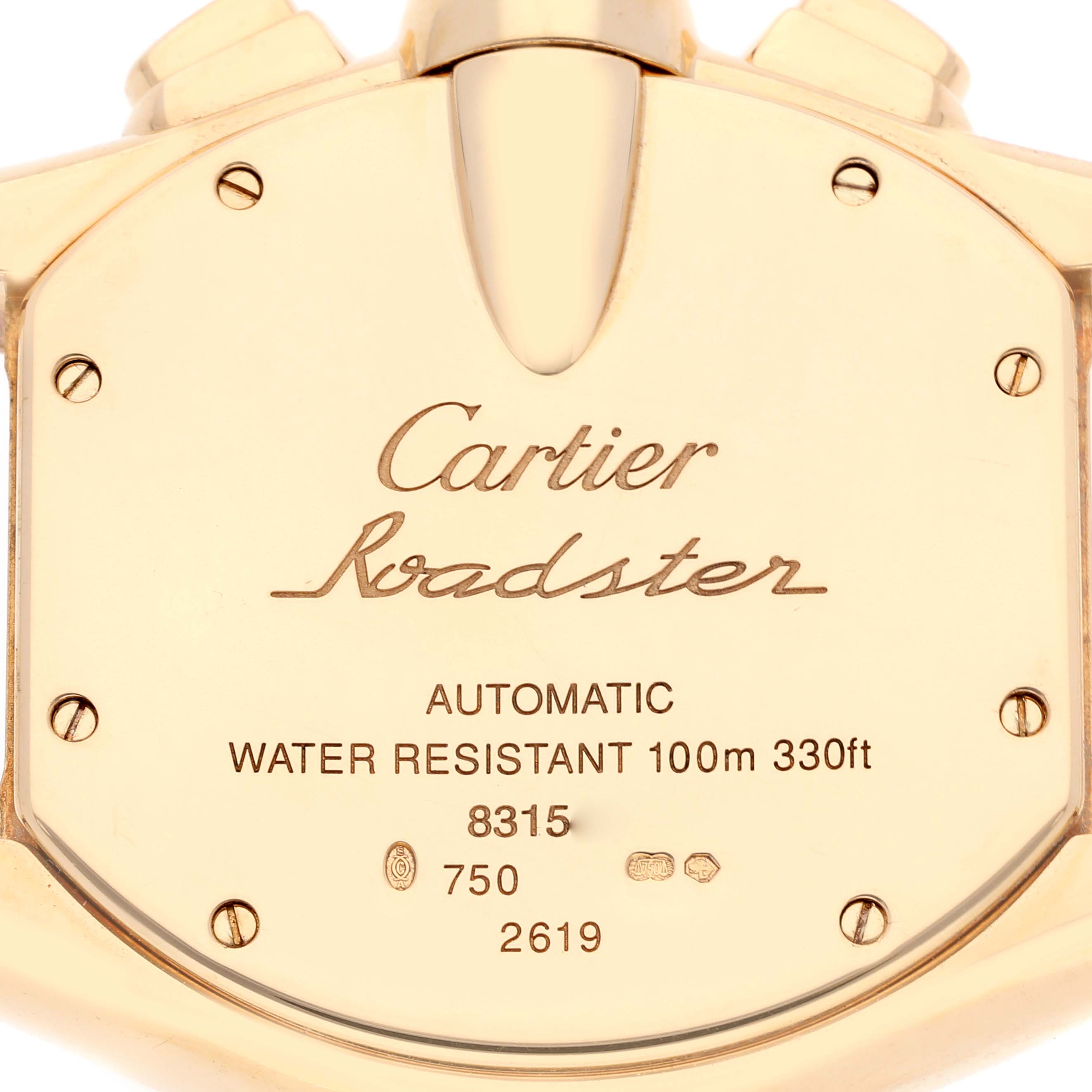The image shows the back case of a Cartier Roadster W62021Y3 Men's Yellow Gold Silver Dial W62021Y3 Men's Yellow Gold Silver Dial watch, highlighting its engravings and water resistance details.