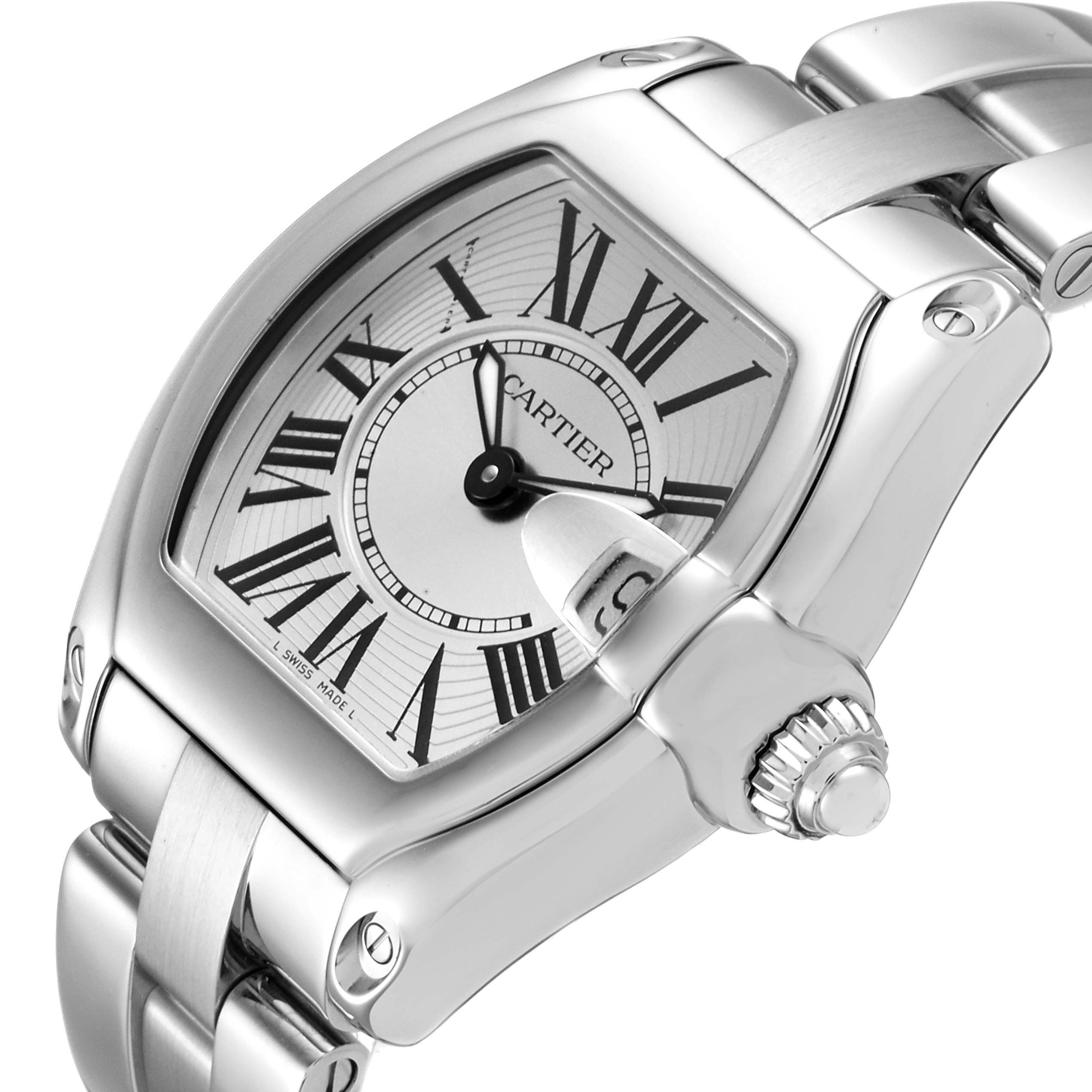 This image shows a close-up of the dial, crown, and part of the bracelet of the Cartier Roadster W62016V3 Women
s Stainless Steel Silver Dial W62016V3 Women
s Stainless Steel Silver Dial watch.