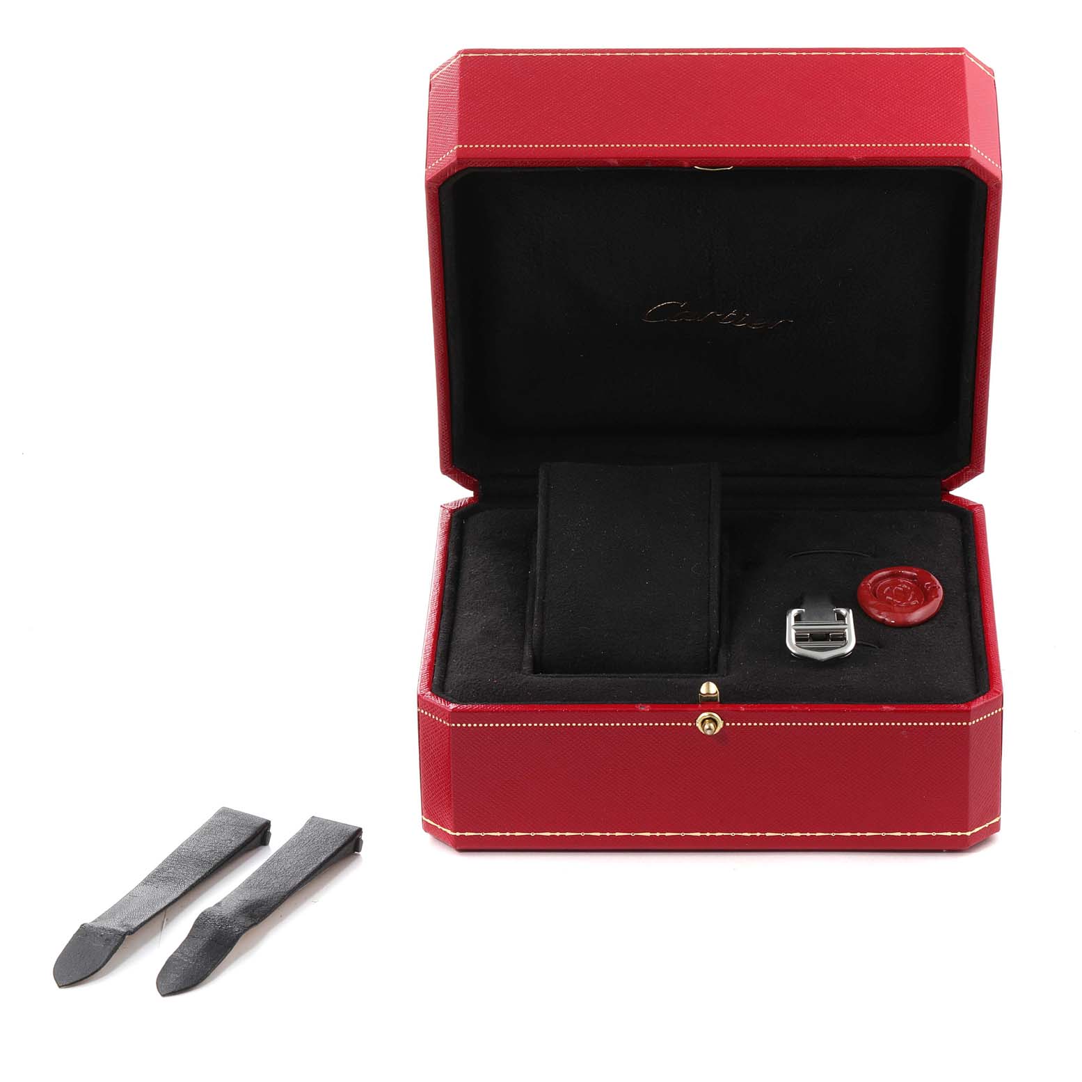 The image shows a Cartier Roadster W62016V3 Women's Stainless Steel Silver Dial W62016V3 Women's Stainless Steel Silver Dial model watch box and accessories, including a strap and buckle, from a top-down angle.