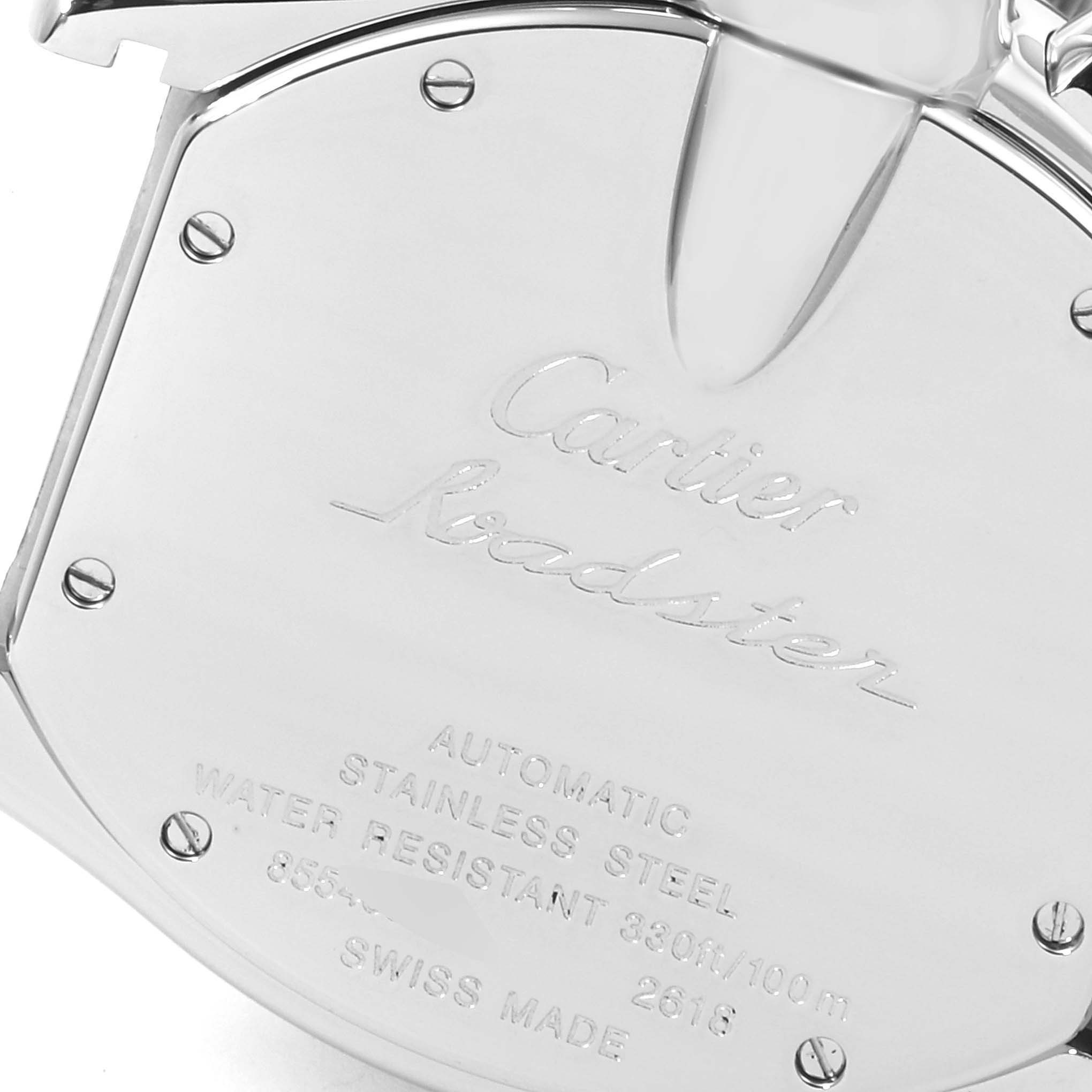 The image shows the back case of the Cartier Roadster W62019X6 Men
s Stainless Steel Silver Dial W62019X6 Men
s Stainless Steel Silver Dial watch, highlighting its inscriptions and screw details.
