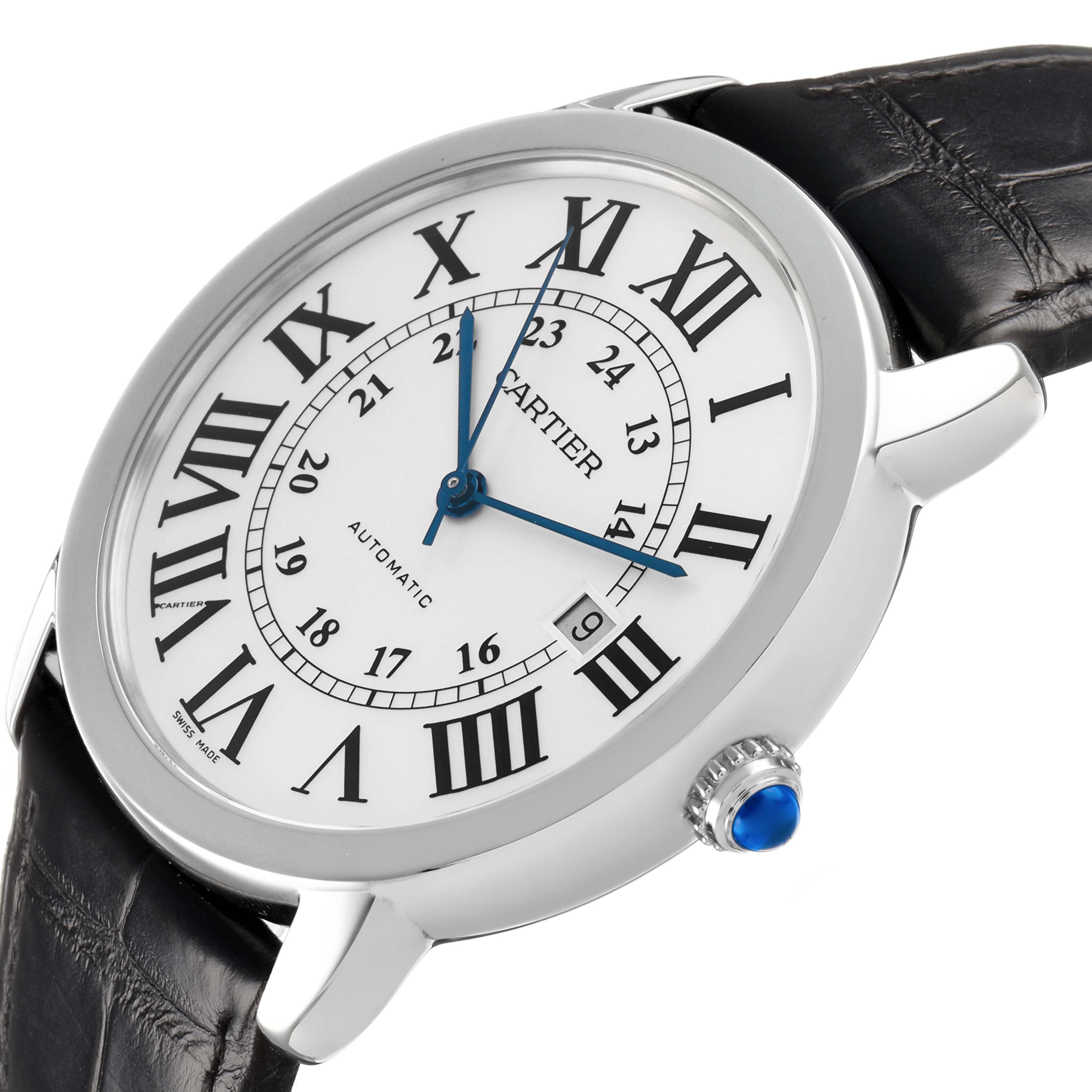 The Cartier Ronde W6701010 Men's Stainless Steel Silver Dial watch is shown at an angle highlighting the face, Roman numerals, date, and blue cabochon crown.