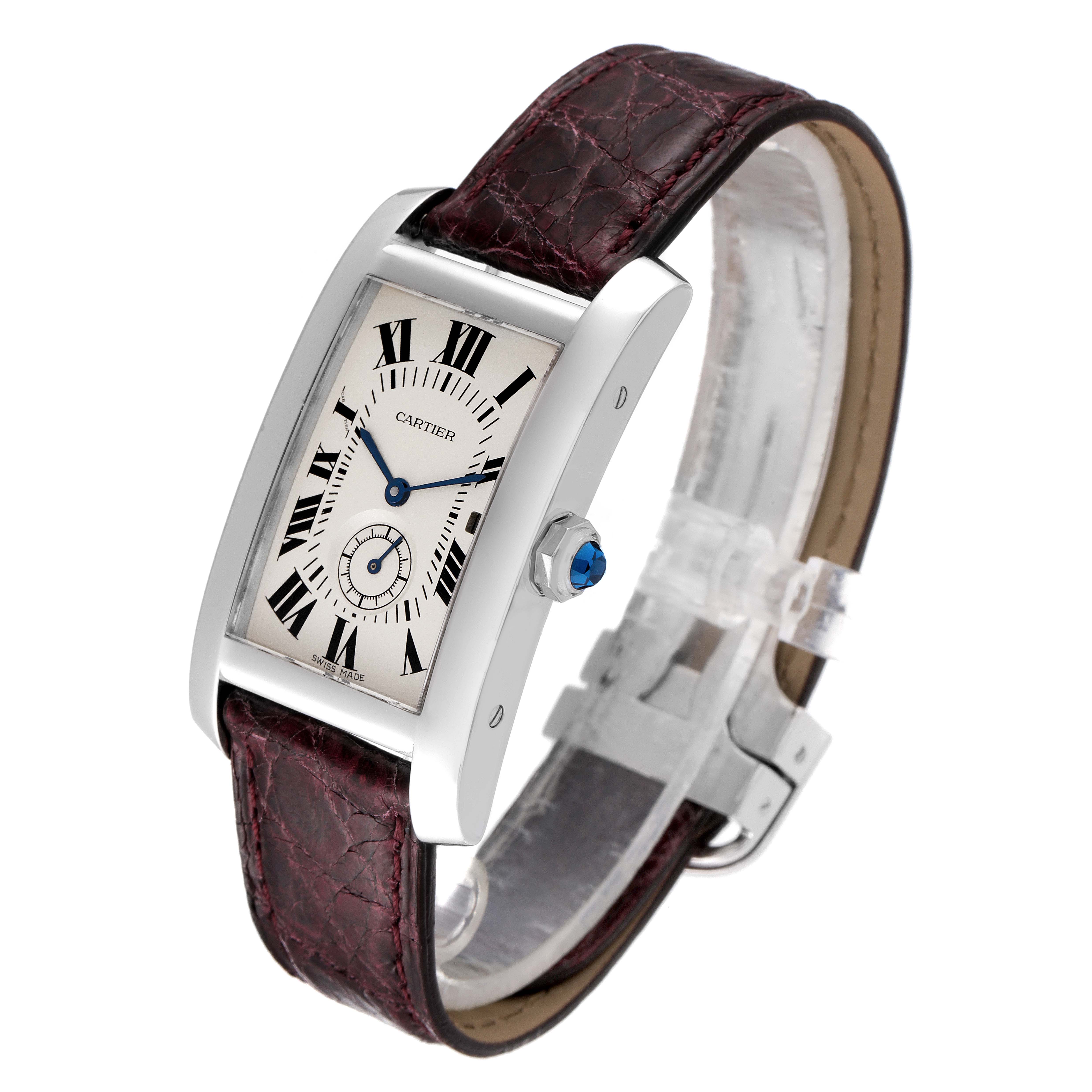 This image shows a Cartier Tank Americaine 3012905 Women's White Gold Silver Dial 3012905 Women's White Gold Silver Dial watch at an angled view, highlighting the dial, case, crown, and leather strap.