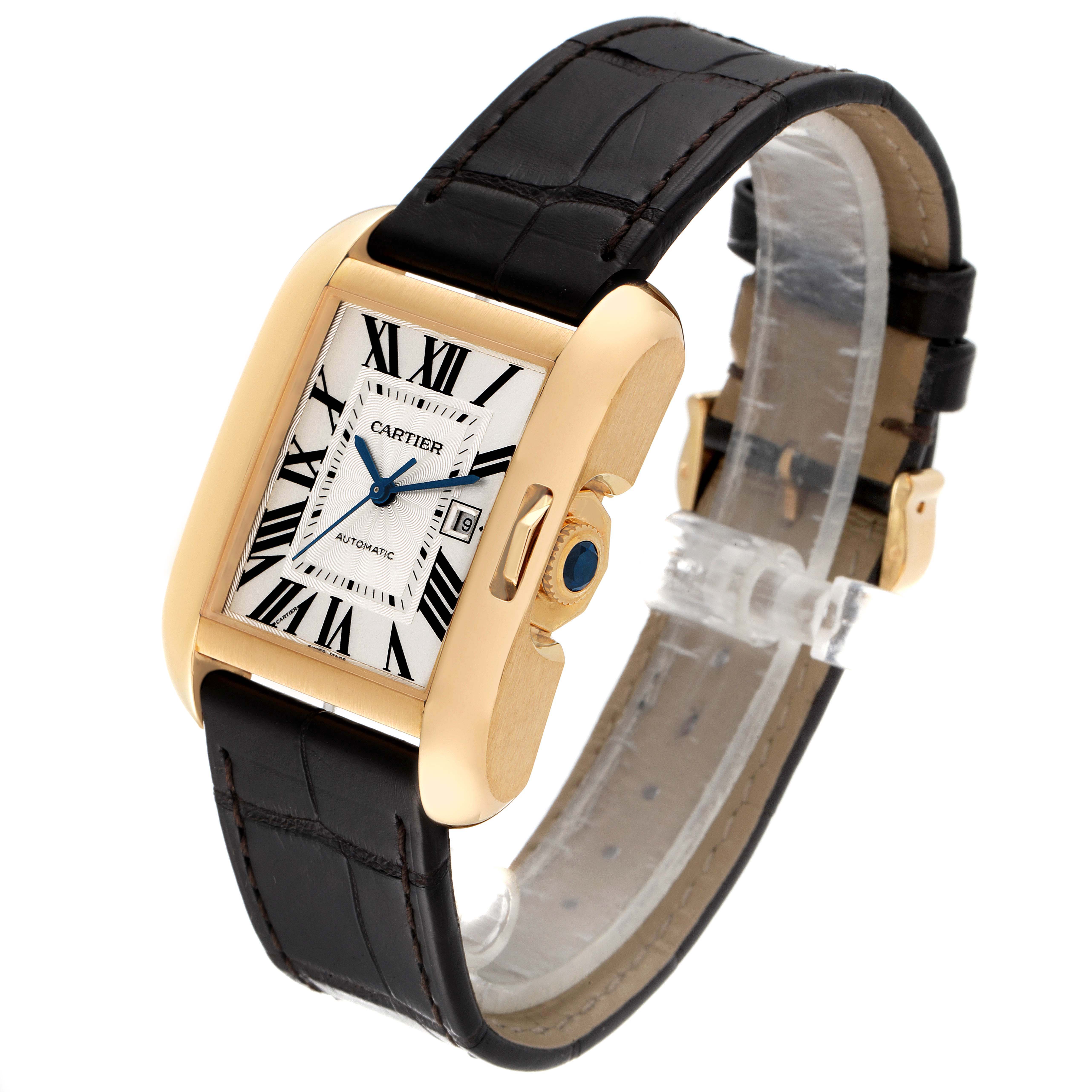 This image shows a Cartier Tank Anglaise W5310030 Men's Yellow Gold Silver Dial W5310030 Men's Yellow Gold Silver Dial watch at a slight angle, highlighting its gold case, rectangular dial, and black leather strap.