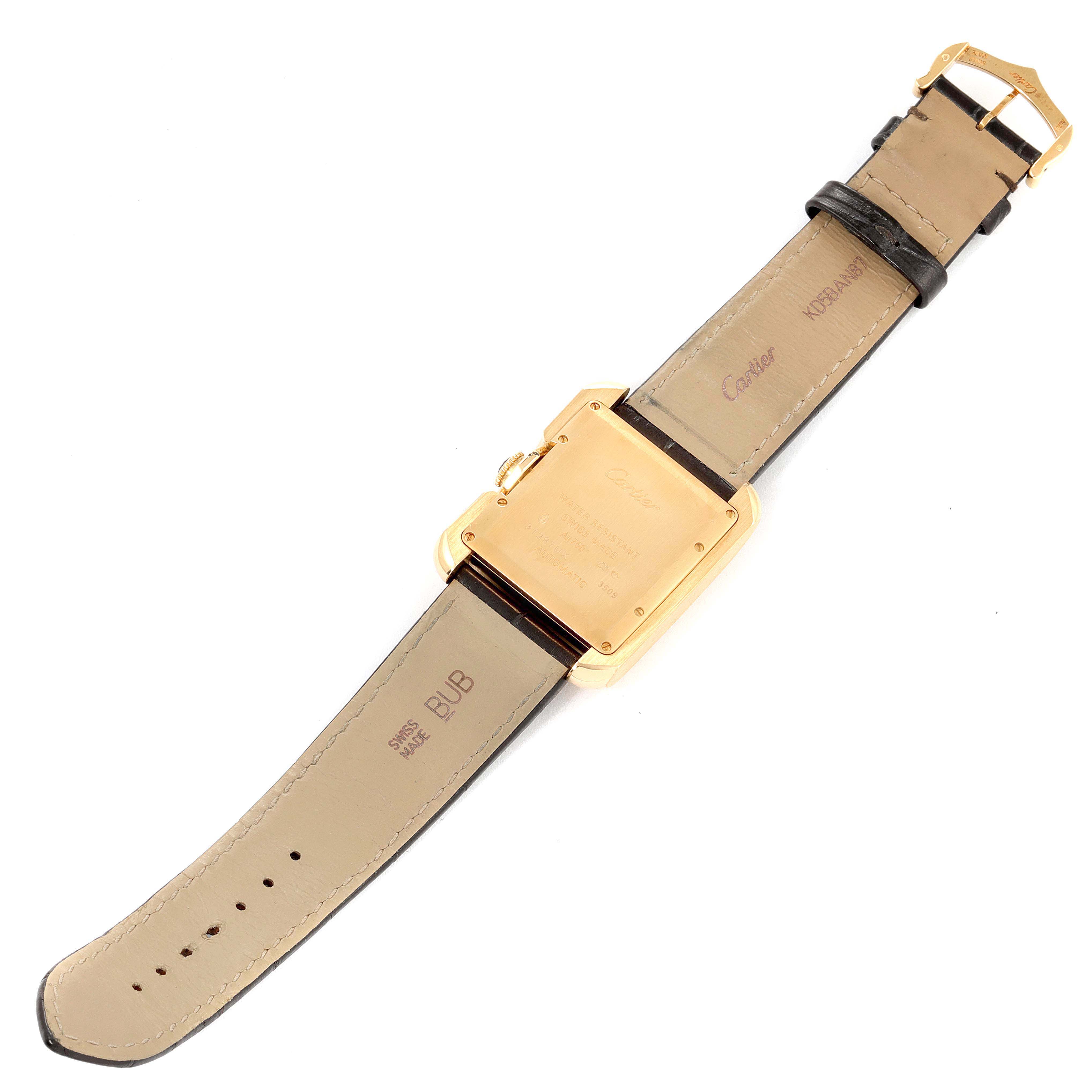 The Cartier Tank Anglaise W5310030 Men's Yellow Gold Silver Dial W5310030 Men's Yellow Gold Silver Dial watch is shown from the back, displaying its gold case and leather strap.