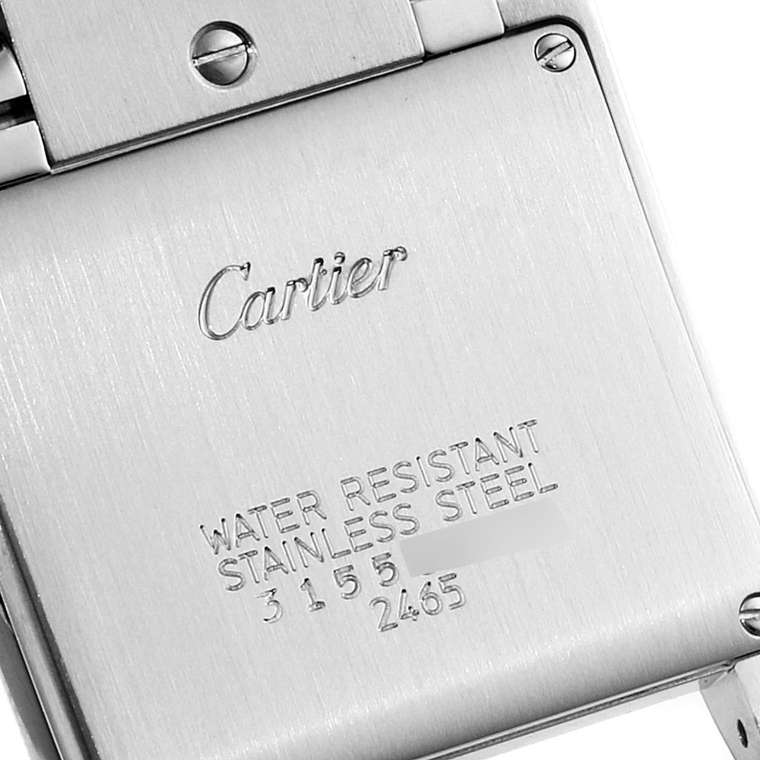 This image shows the back case of a Cartier Tank Française watch, highlighting the engraved logo and specifications.