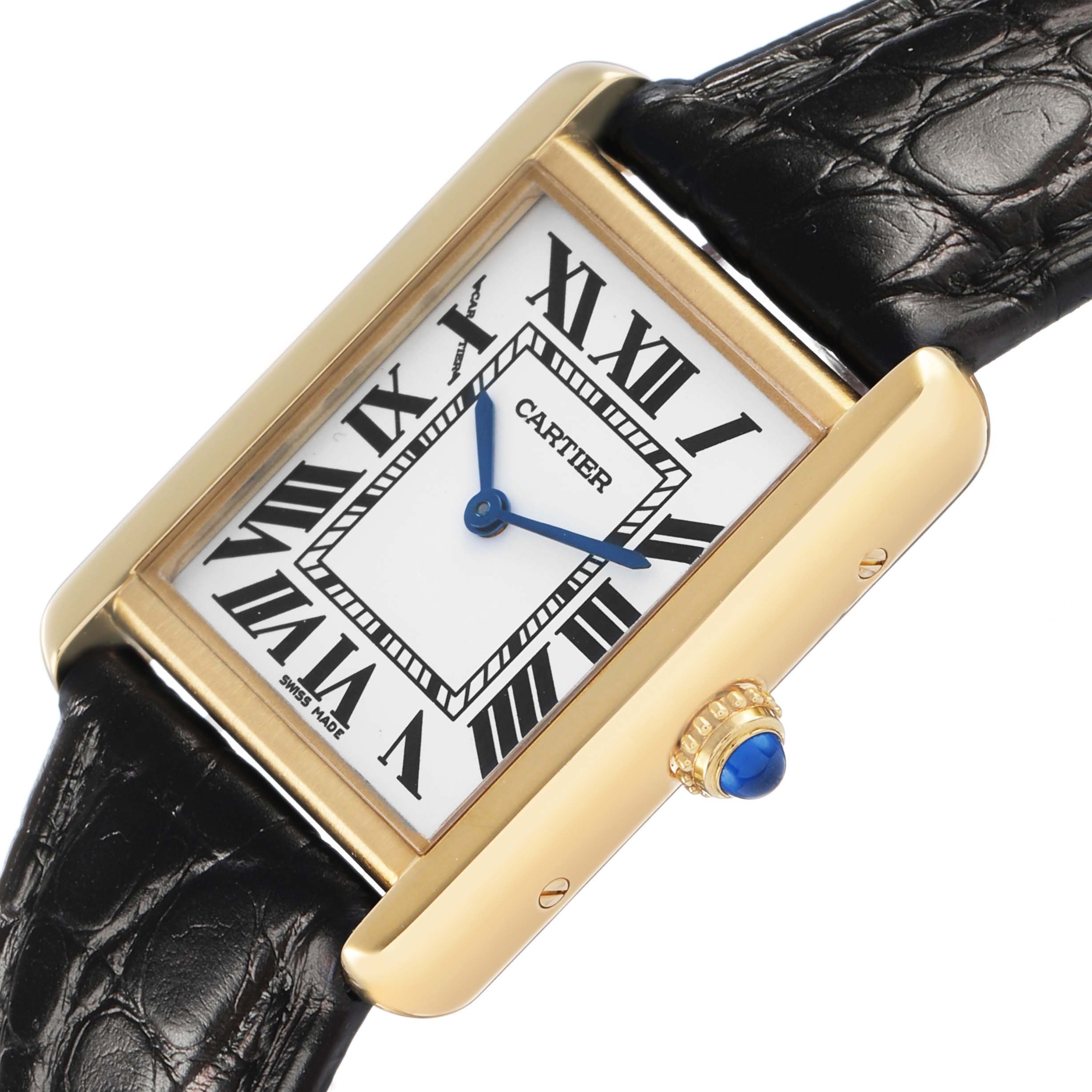 The Cartier Tank Solo W5200002 Women's Yellow Gold Silver Dial watch is shown at an angled top-down view, displaying its rectangular face, Roman numerals, and leather strap.