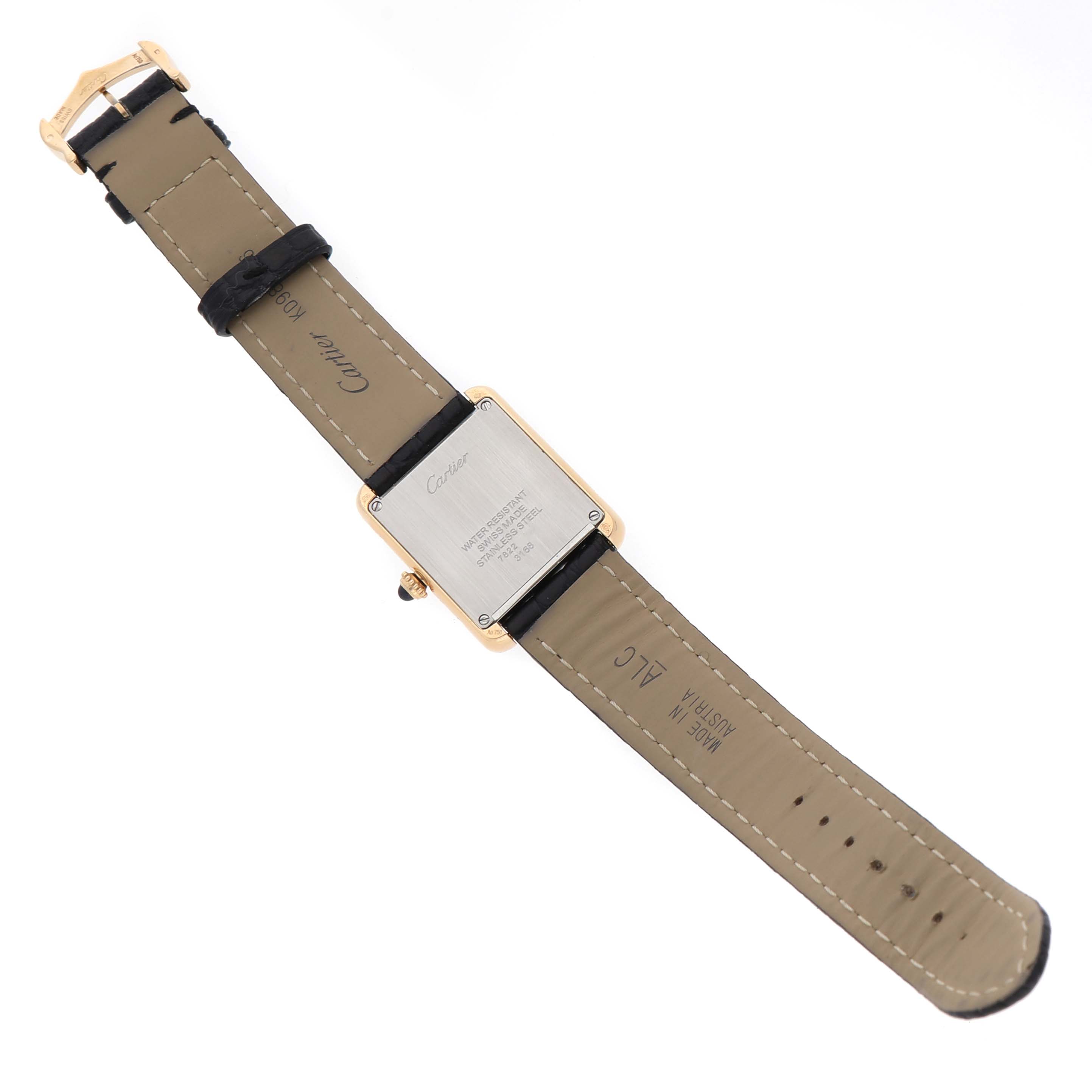 The image shows the back view of a Cartier Tank Solo W5200002 Women's Yellow Gold Silver Dial watch, highlighting the leather strap, buckle, and case back.