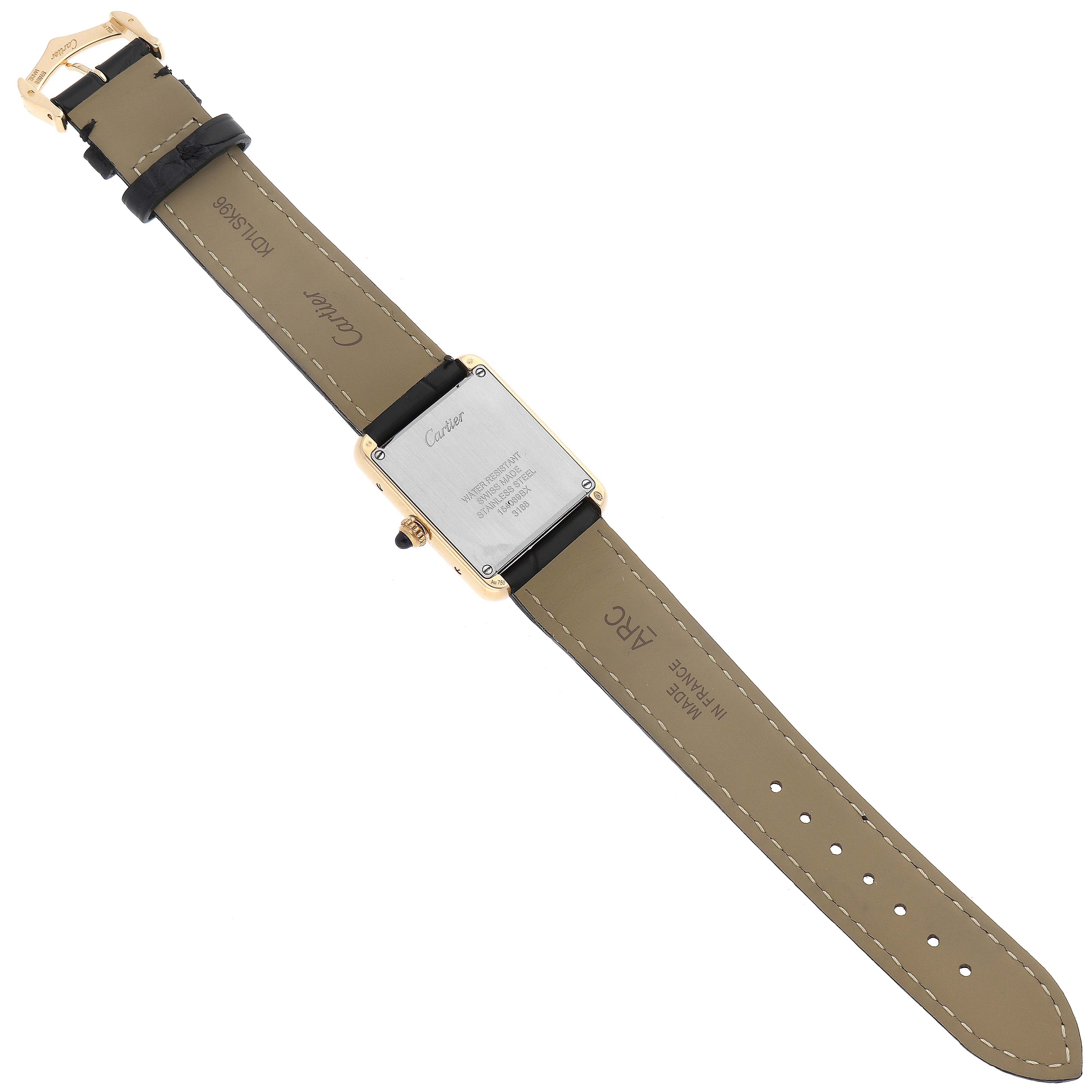 The Cartier Tank Solo W5200002 Women's Yellow Gold Silver Dial W5200002 Women's Yellow Gold Silver Dial watch is shown from the back, displaying its case back and leather strap.