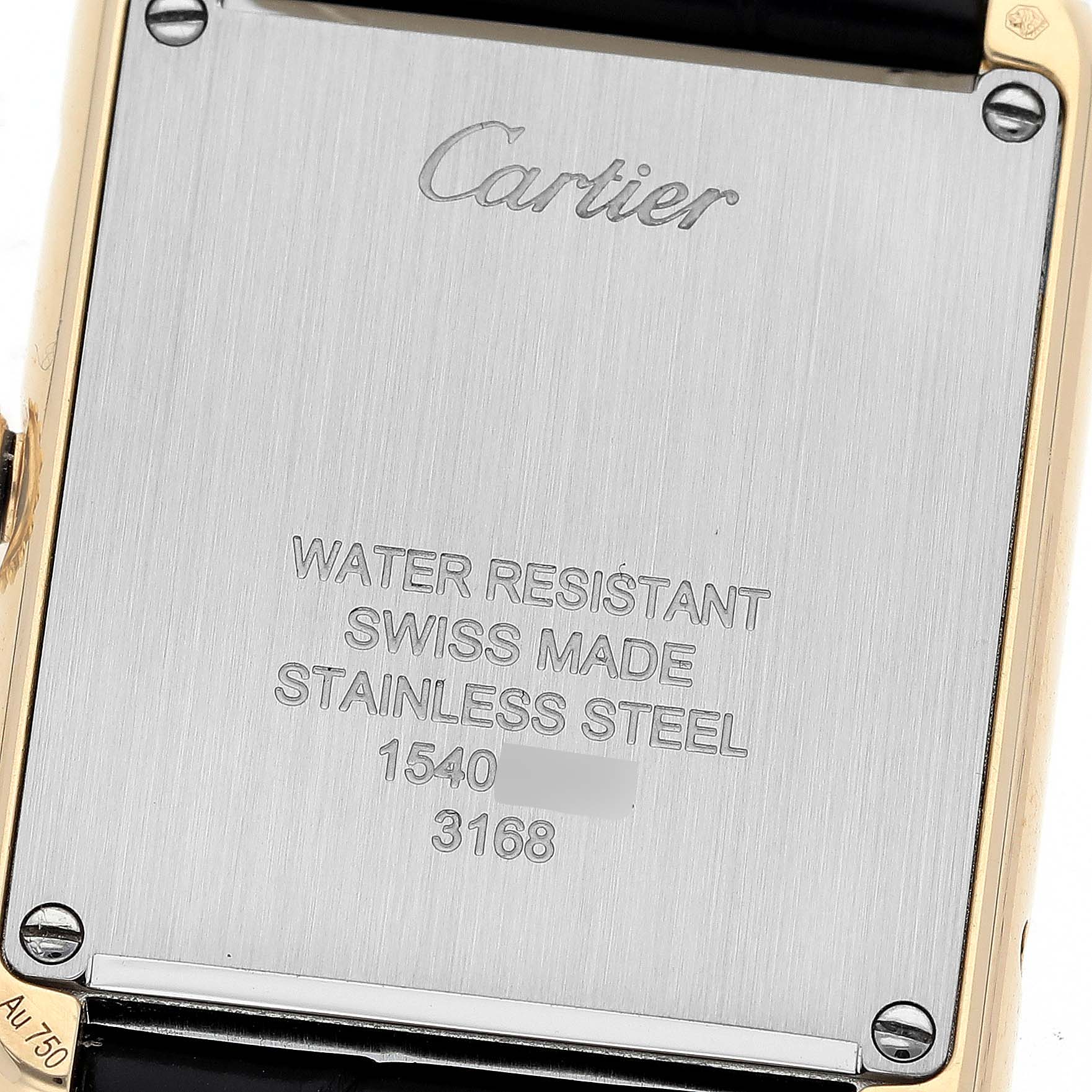 This image shows the backside of the Cartier Tank Solo W5200002 Women's Yellow Gold Silver Dial W5200002 Women's Yellow Gold Silver Dial watch, displaying the brand, model details, and material information.