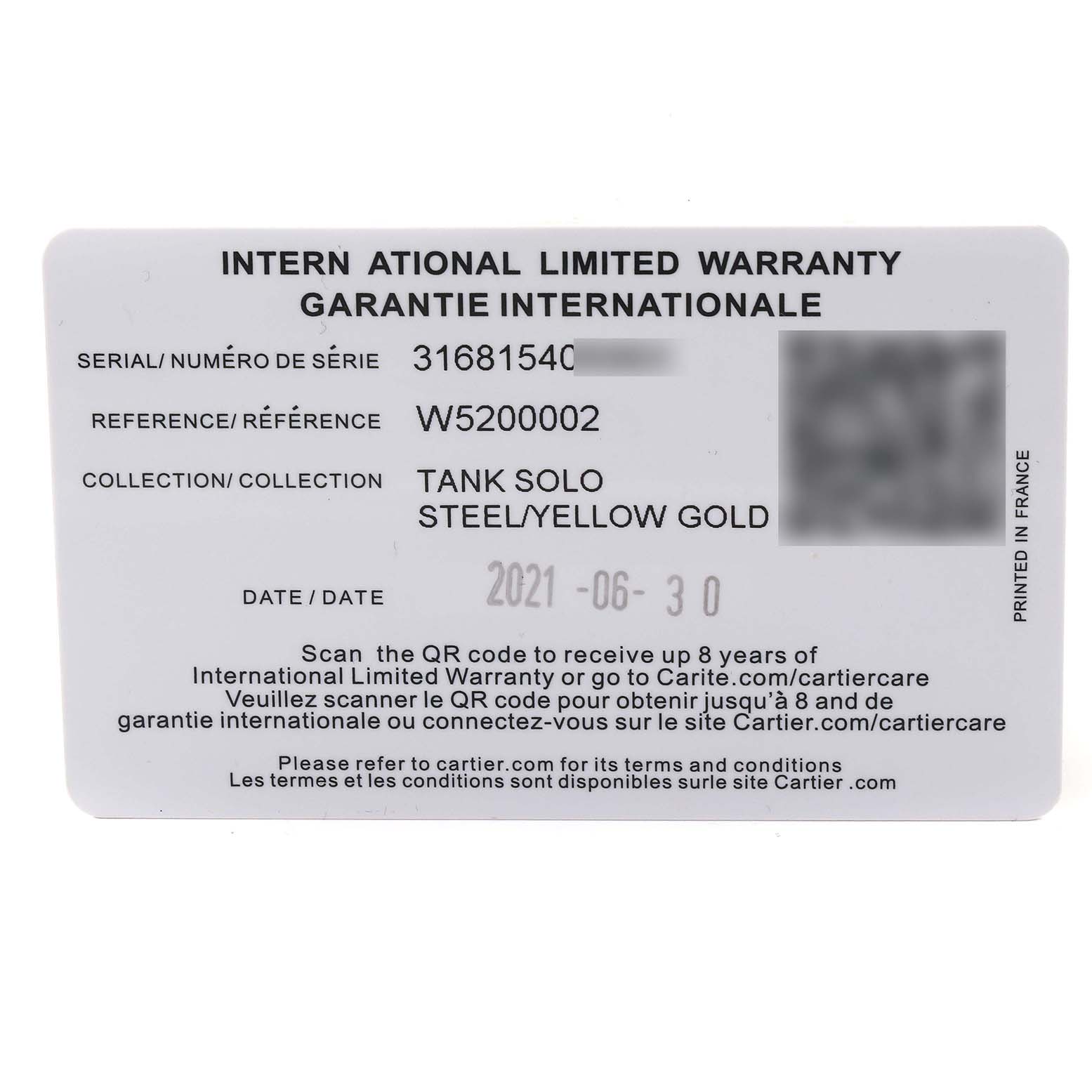 The image shows an International Limited Warranty card for a Cartier Tank Solo W5200002 Women's Yellow Gold Silver Dial W5200002 Women's Yellow Gold Silver Dial watch.