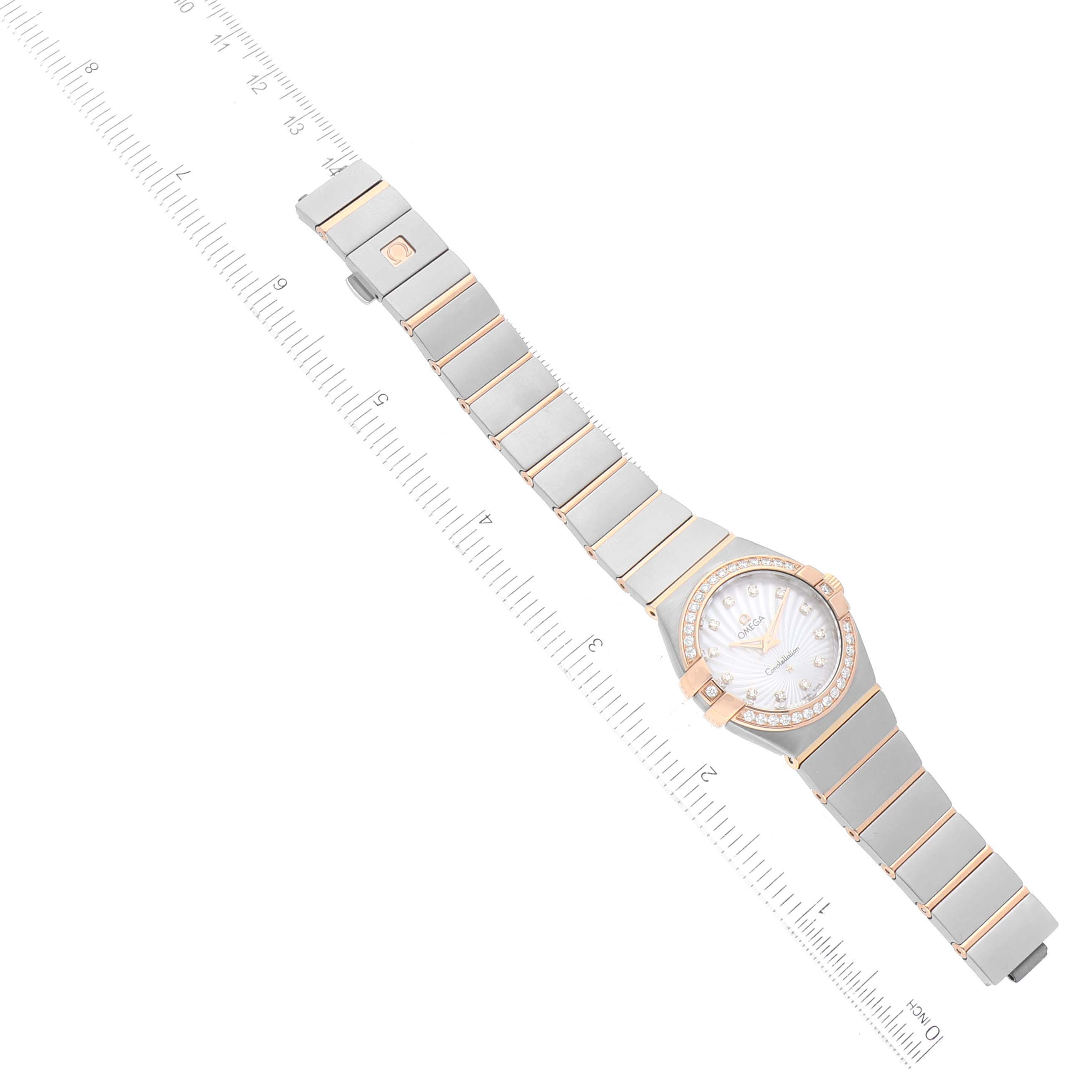 The Omega 123.25.27.60.55.002 Women's Steel and Gold (two tone) Mother of Pearl Dial 123.25.27.60.55.002 Women's Steel and Gold (two tone) Mother of Pearl Dial Constellation 27 Steel Rose Gold Mother Of Pearl Diamond Ladies Watch 123.25.27.60.55.002 is shown from a top-down angle.