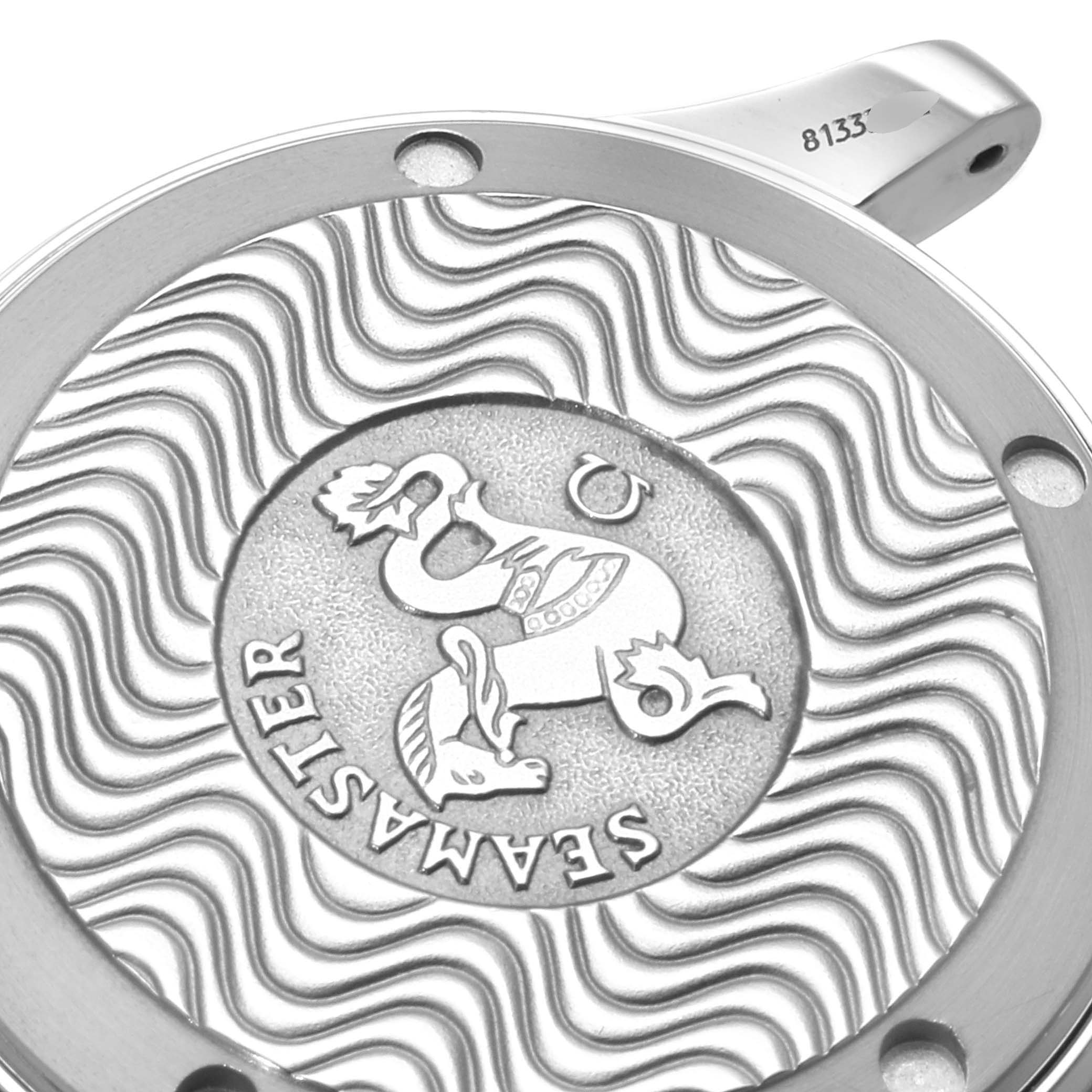 This image shows the intricately engraved case back of an Omega Seamaster 2252.50.00 Men
s Stainless Steel Black Dial 2252.50.00 Men
s Stainless Steel Black Dial watch from a close-up angle.