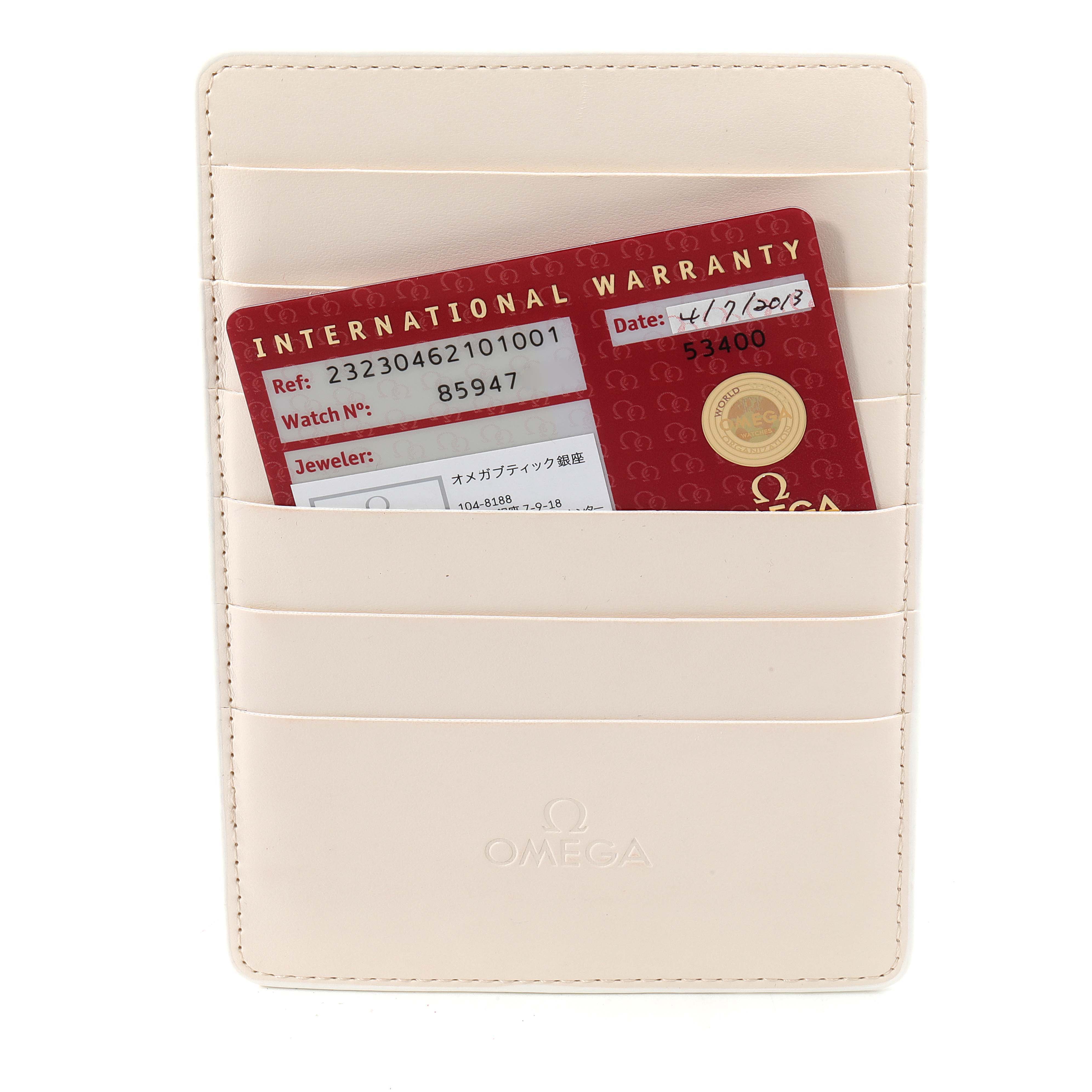 The image shows an Omega Planet Ocean 232.30.46.21.01.001 Men's Stainless Steel Black Dial 232.30.46.21.01.001 Men's Stainless Steel Black Dial watch's International Warranty card in a beige Omega cardholder.