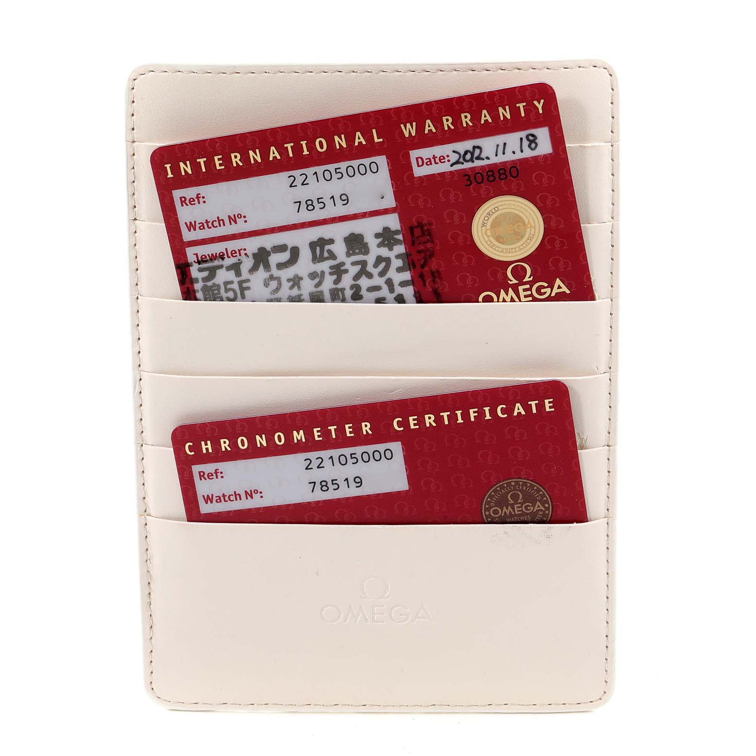 The image shows the warranty card and chronometer certificate for the Omega Planet Ocean 2210.50.00 Men's Stainless Steel Black Dial 2210.50.00 Men's Stainless Steel Black Dial watch, along with a white card holder.