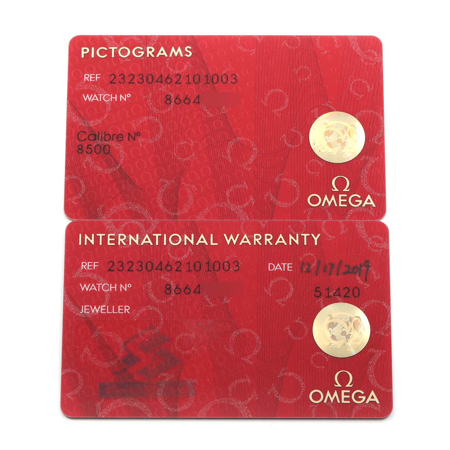 The image shows two cards: a pictogram card and an international warranty card for an Omega Planet Ocean 232.30.46.21.01.003 Men's Stainless Steel Black Dial watch.