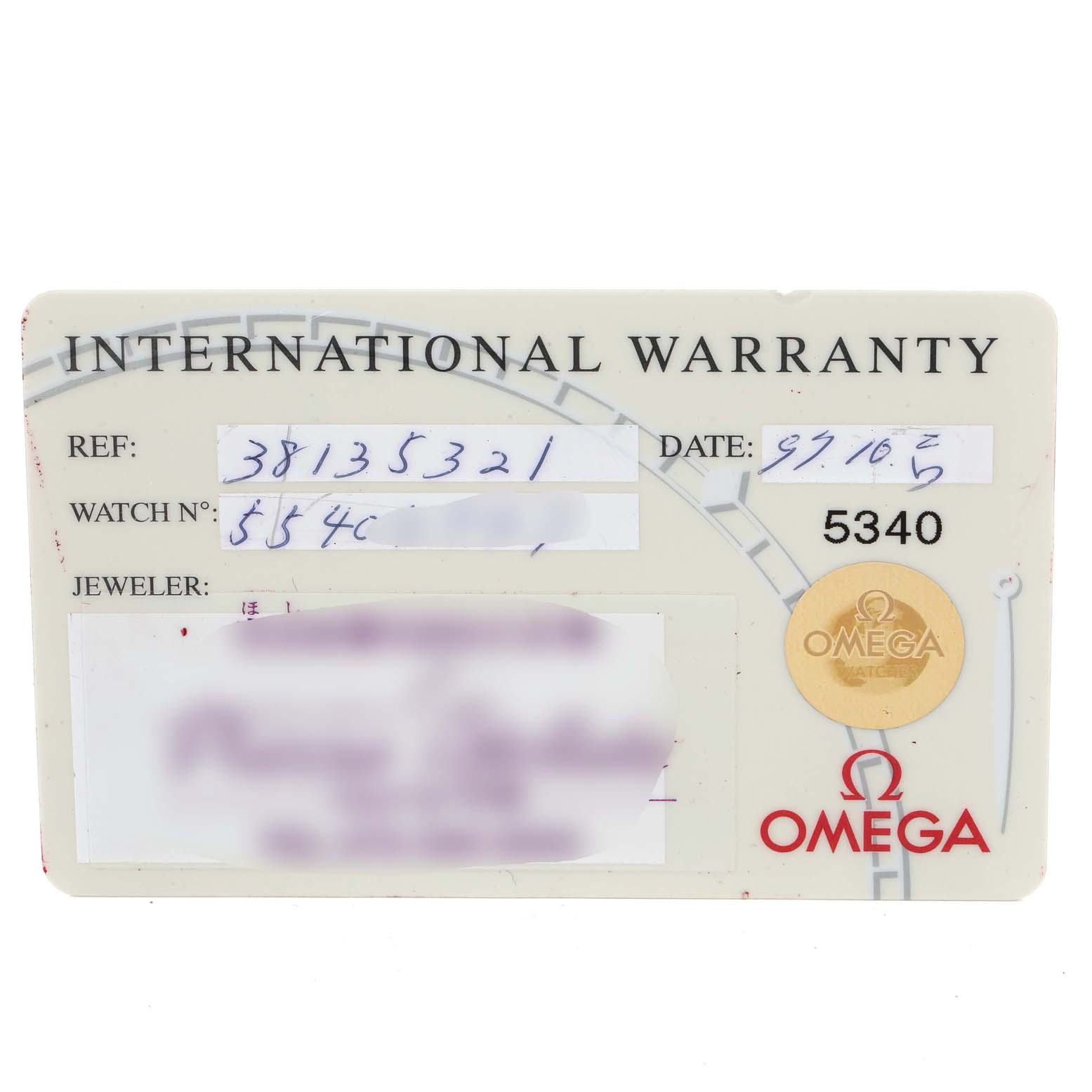 This image shows an international warranty card for the Omega Speedmaster 3513.53.00 Men
s Stainless Steel Black Dial 3513.53.00 Men
s Stainless Steel Black Dial watch model from a top-down angle.