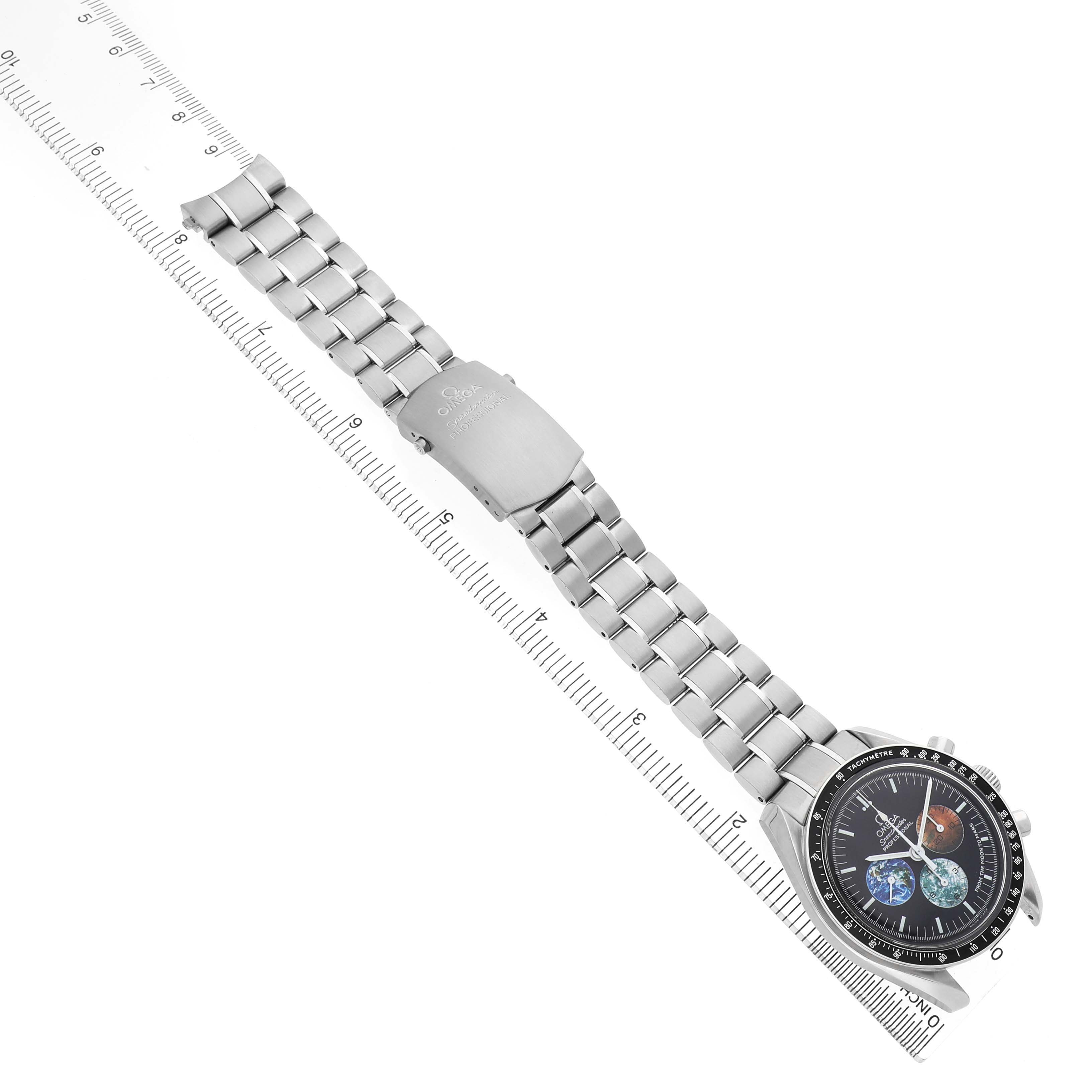 The Omega Speedmaster 3577.50.00 Men's Stainless Steel Black Dial watch is shown at an angle displaying its face and full metal bracelet, alongside a measuring ruler.