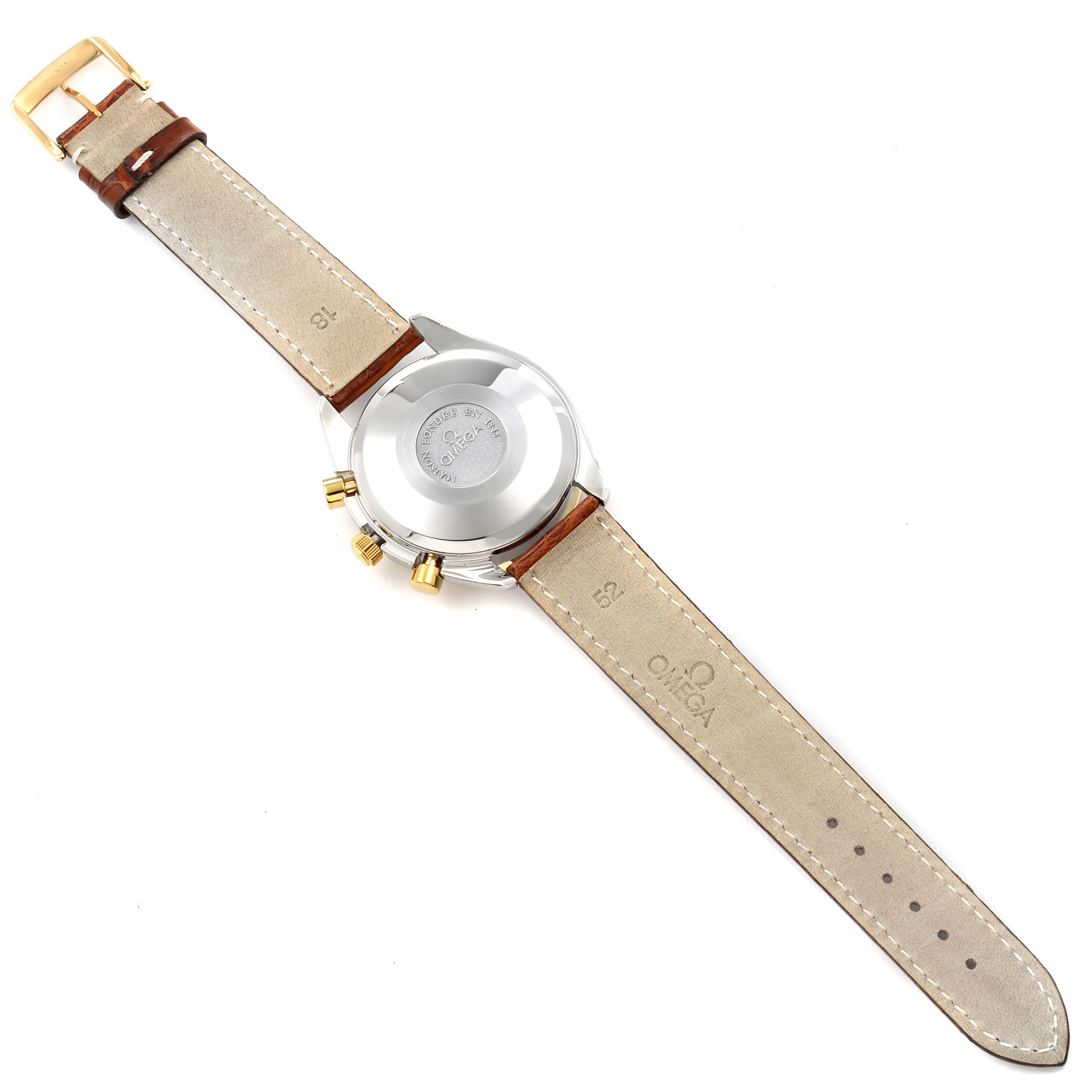 This image shows the back of an Omega Speedmaster 3330.20.00 Men's Steel and Gold (two tone) White Dial 3330.20.00 Men's Steel and Gold (two tone) White Dial watch, highlighting the case back, leather strap, and clasp.