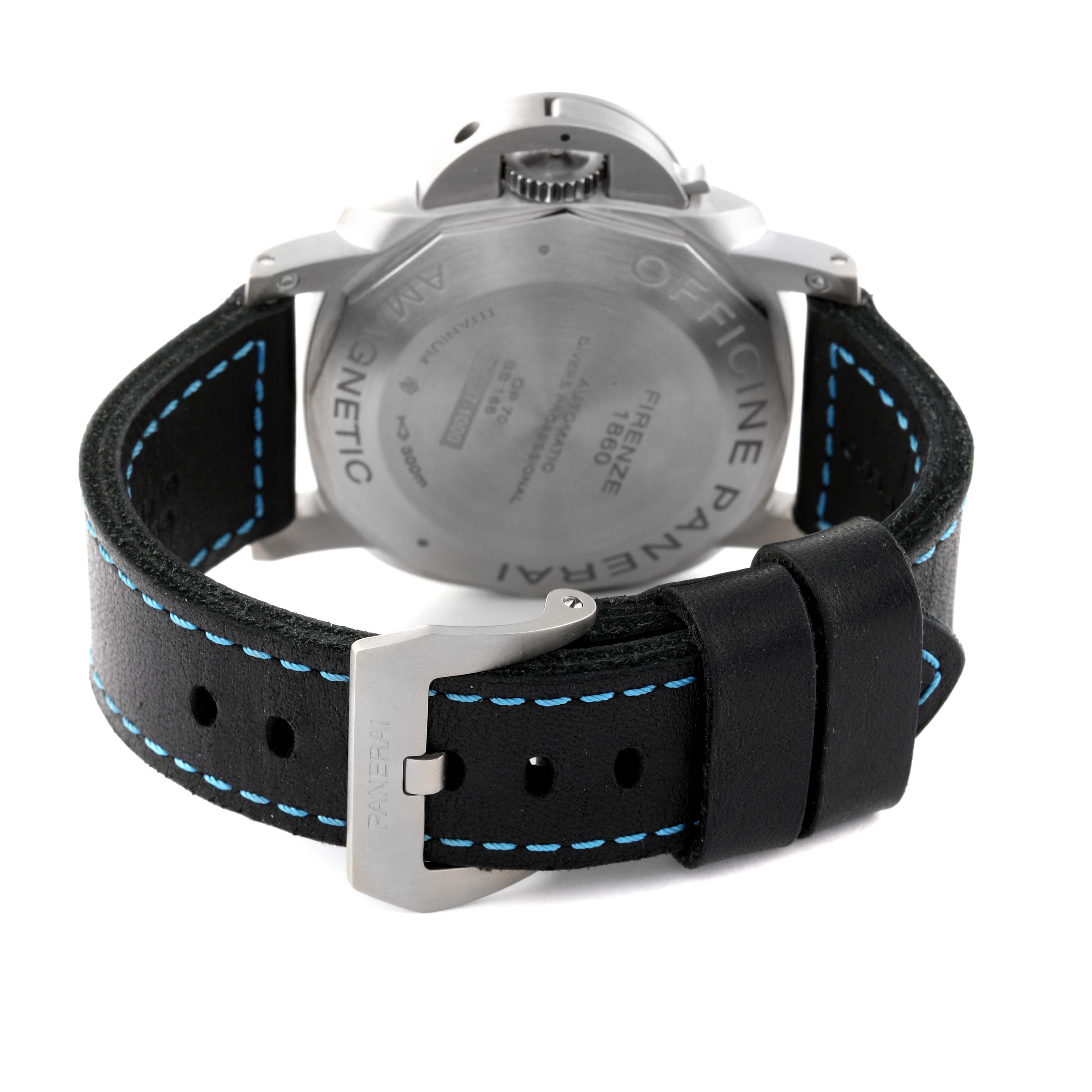 The image shows the back case, crown guard, and black strap with blue stitching of a Panerai Submersible PAM01389 Men
s Titanium Black Dial PAM01389 Men
s Titanium Black Dial watch.