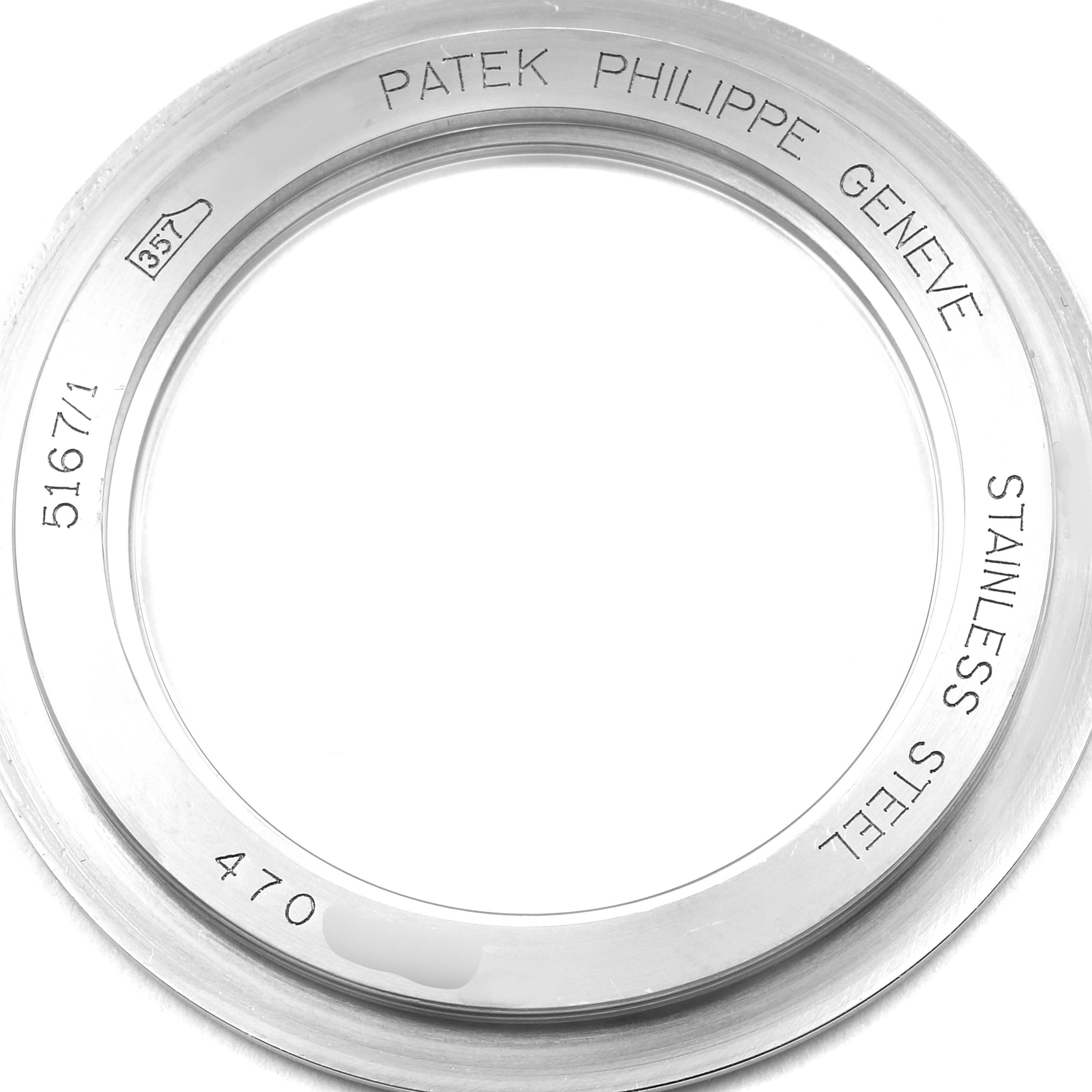 The image shows a stainless steel bezel for the Patek Philippe Aquanaut 5167/1A Men's Stainless Steel Black Dial 5167/1A Men's Stainless Steel Black Dial model, with the text and model number engraved.