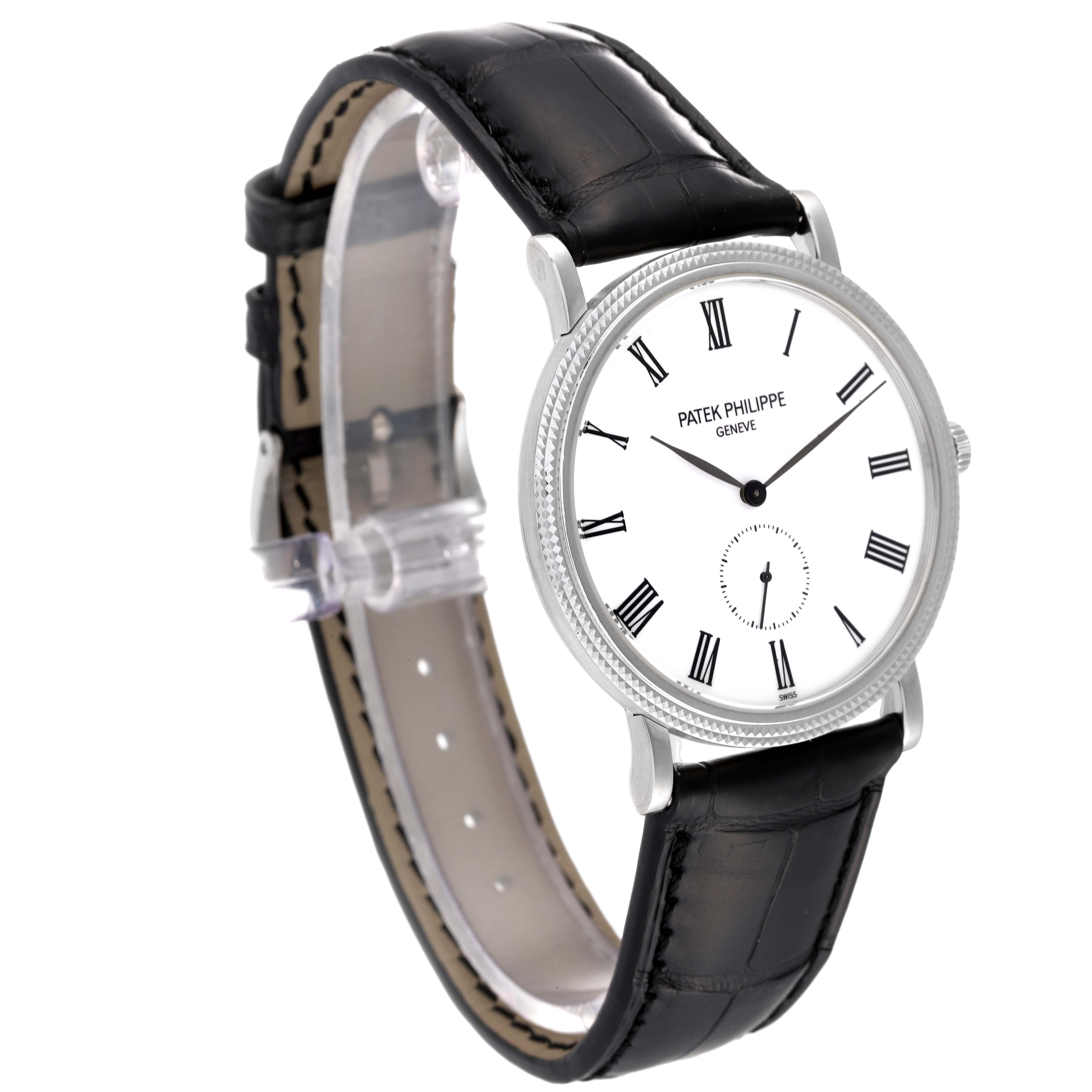 The image shows a side view of a Patek Philippe Calatrava 5119G Men
s White Gold White Dial 5119G Men
s White Gold White Dial watch, featuring the dial and leather strap.