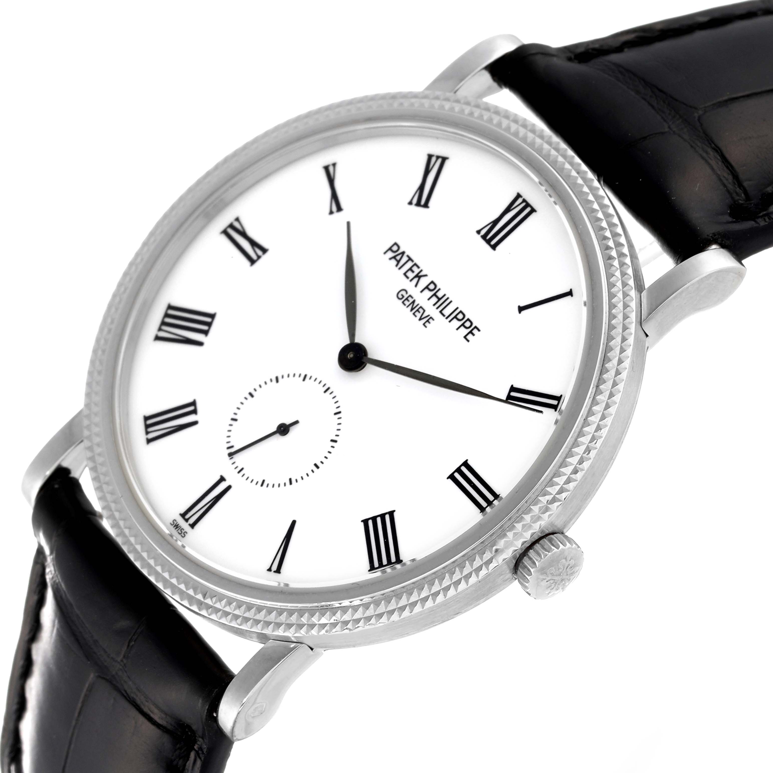 The image shows a Patek Philippe Calatrava 5119G Men
s White Gold White Dial 5119G Men
s White Gold White Dial watch angled to display the face, crown, bezel, and strap attachments.
