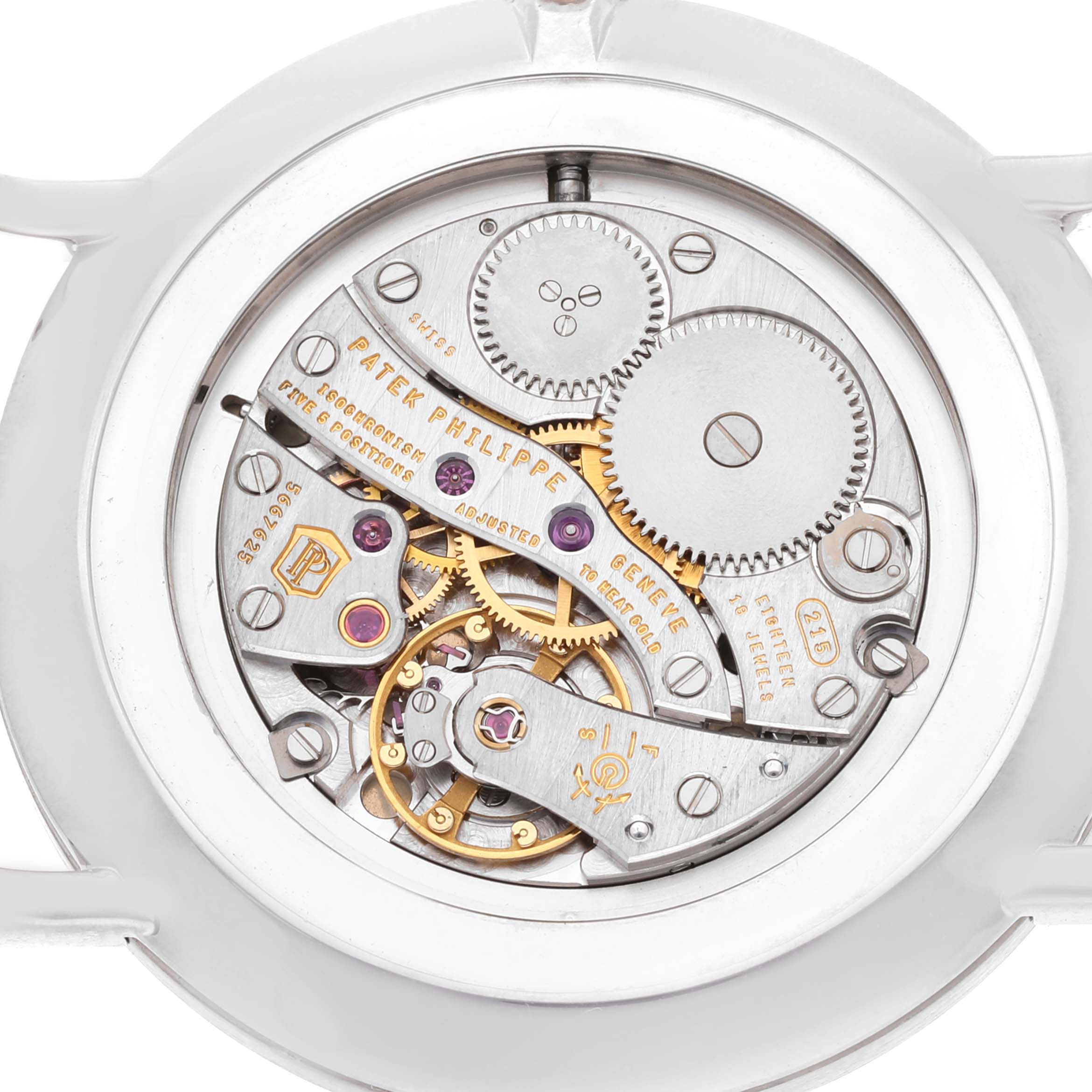 The image shows the intricate inner workings and movement mechanism of a Patek Philippe Calatrava 5119G Men
s White Gold White Dial 5119G Men
s White Gold White Dial watch from the back angle.
