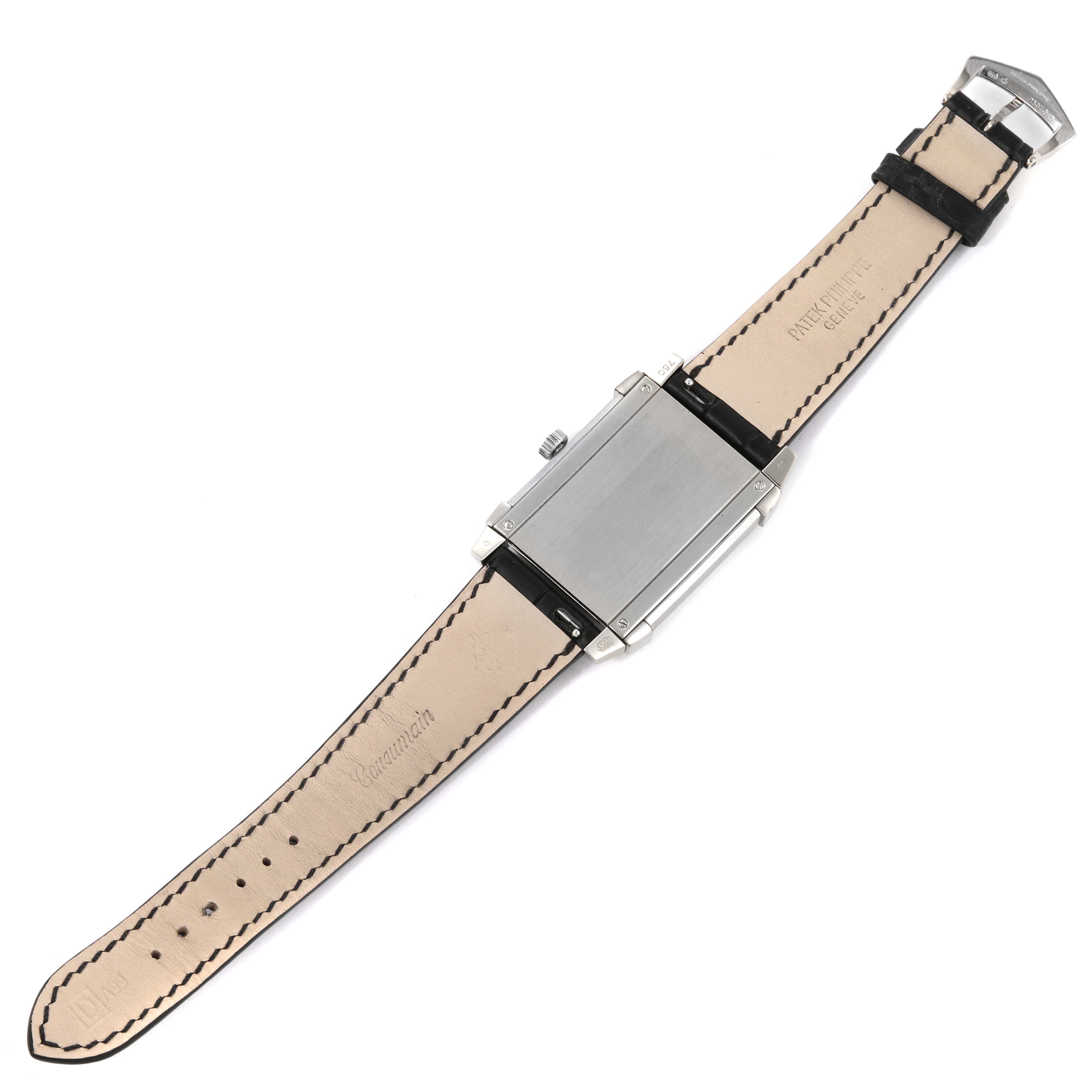 The image shows the back view of a Patek Philippe Gondolo 5111G Men
s White Gold Silver Dial 5111G Men
s White Gold Silver Dial watch, highlighting the leather strap and case back.