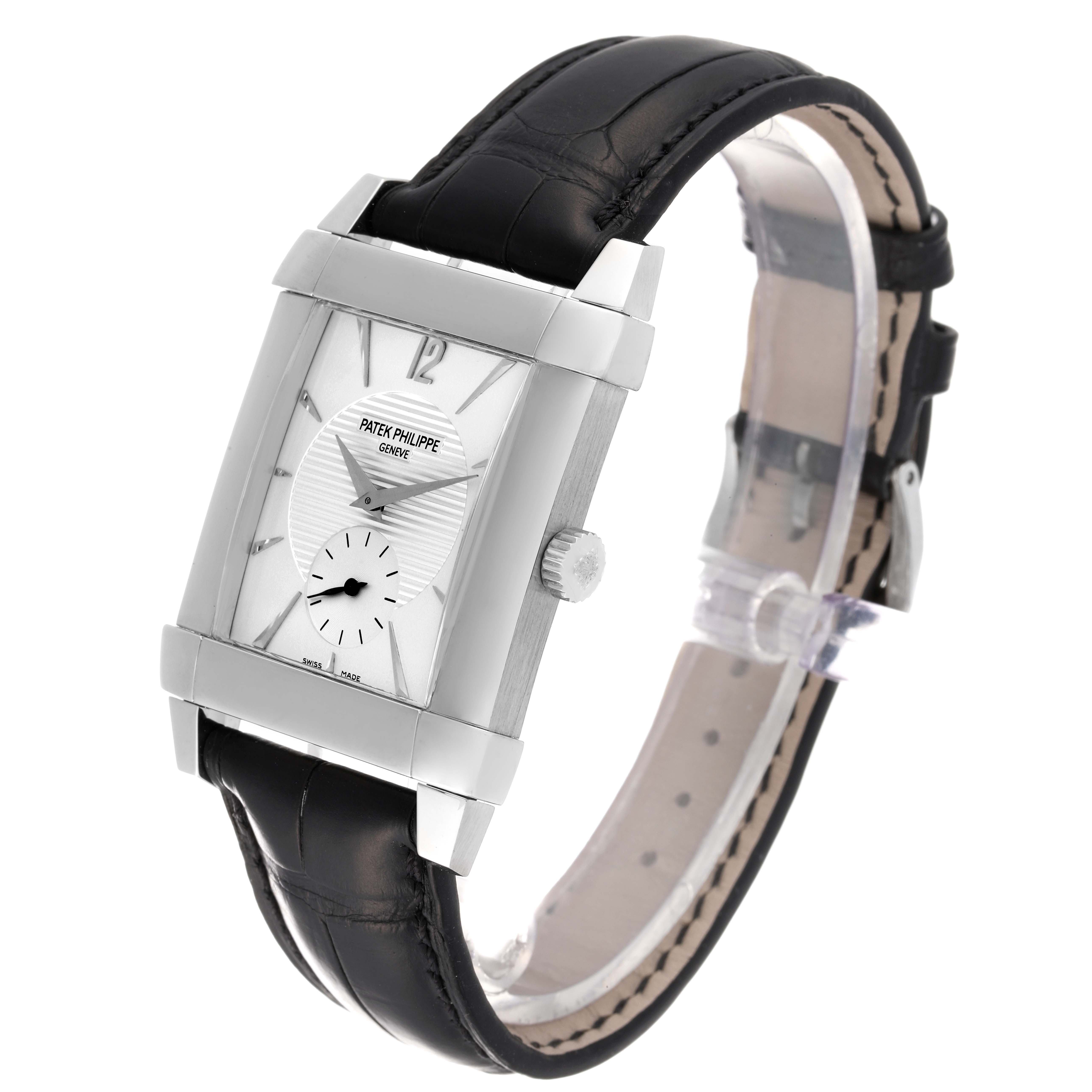 The image shows a Patek Philippe Gondolo 5111G Men
s White Gold Silver Dial 5111G Men
s White Gold Silver Dial watch at a three-quarter angle, highlighting its face, case, crown, and leather strap.