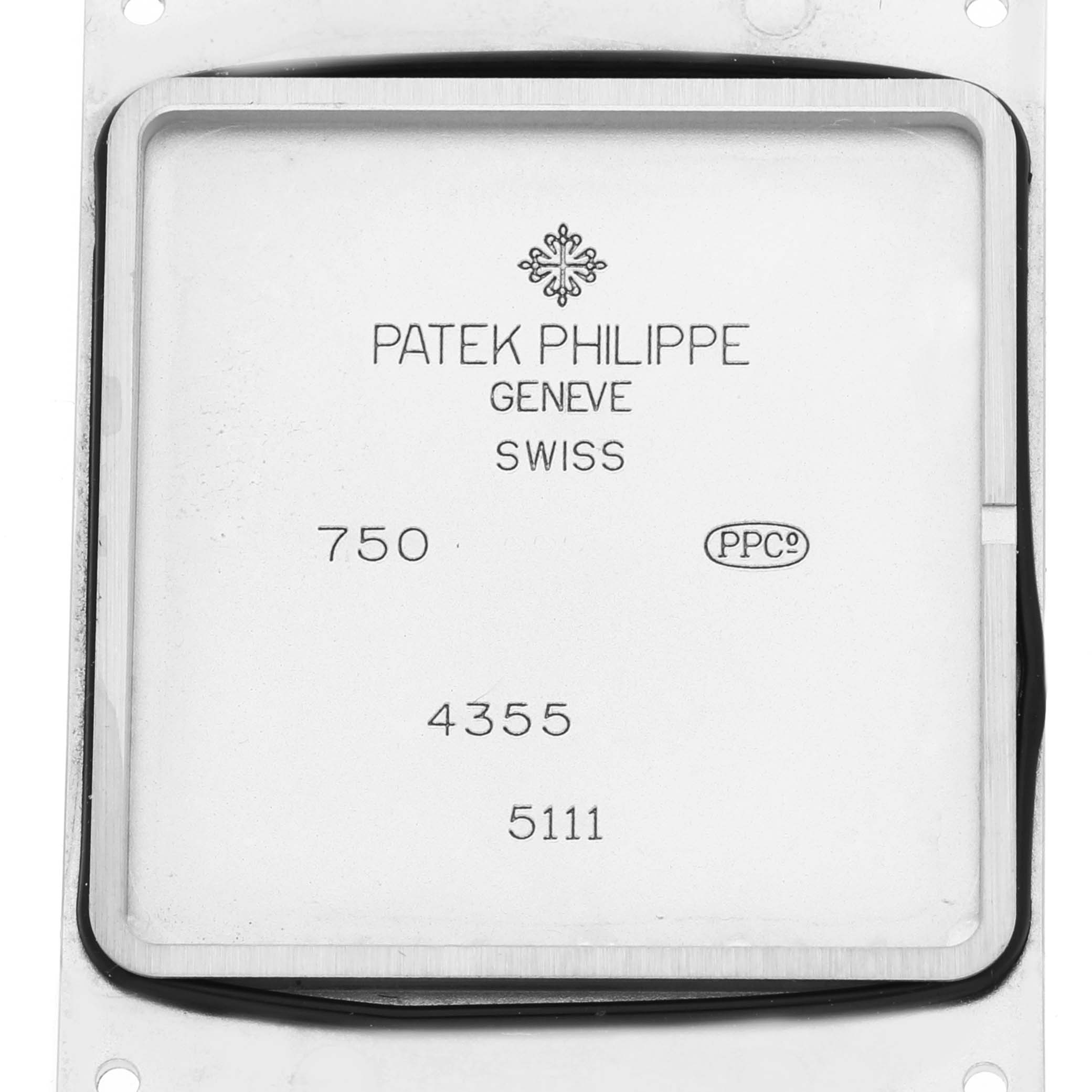 This image shows the back cover of a Patek Philippe Gondolo 5111G Men
s White Gold Silver Dial 5111G Men
s White Gold Silver Dial watch, displaying the branding and model numbers.