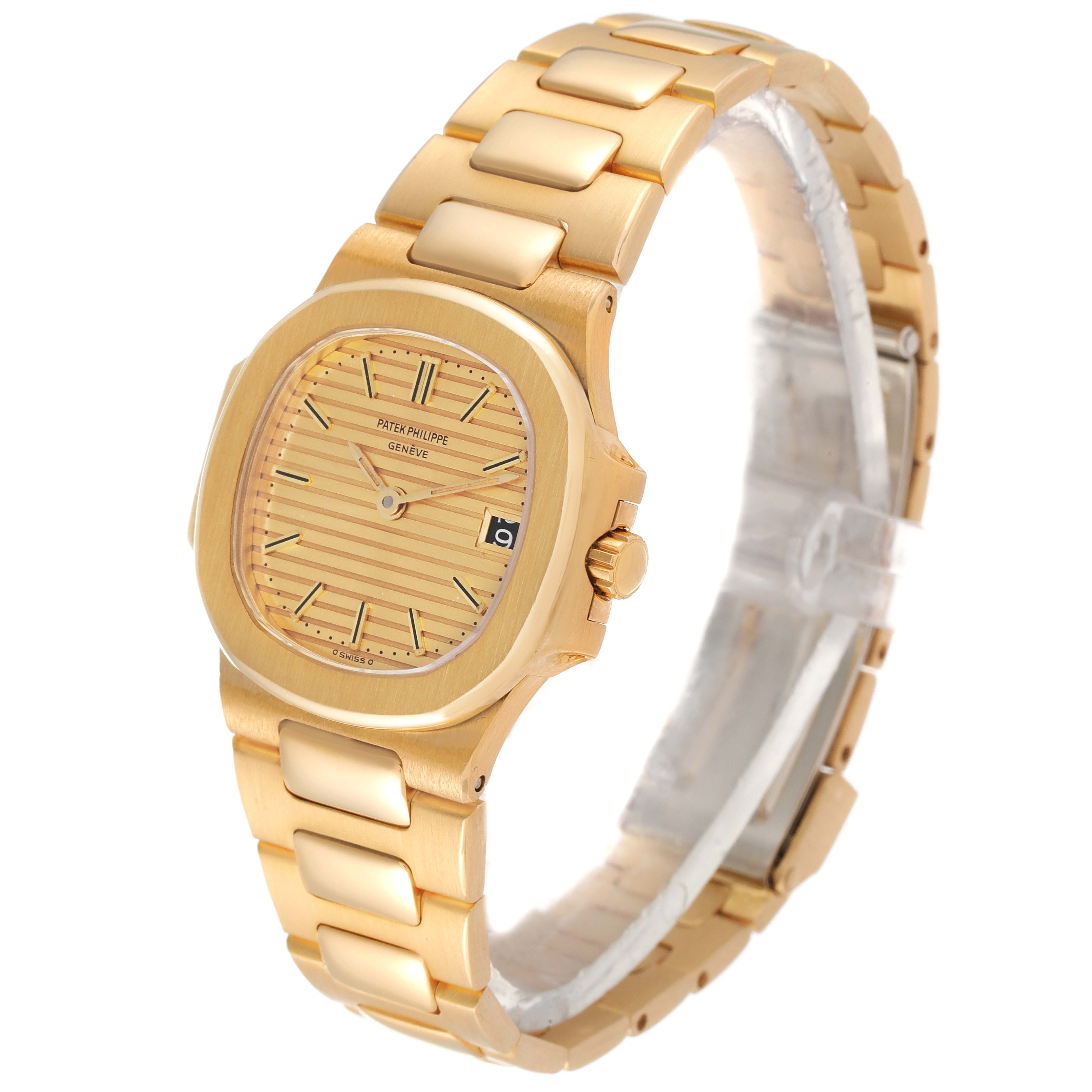 The image shows a gold Patek Philippe Nautilus 4700/1 Women's Yellow Gold Champagne Dial 4700/1 Women's Yellow Gold Champagne Dial watch from an angled front and side view, highlighting the bracelet and face.