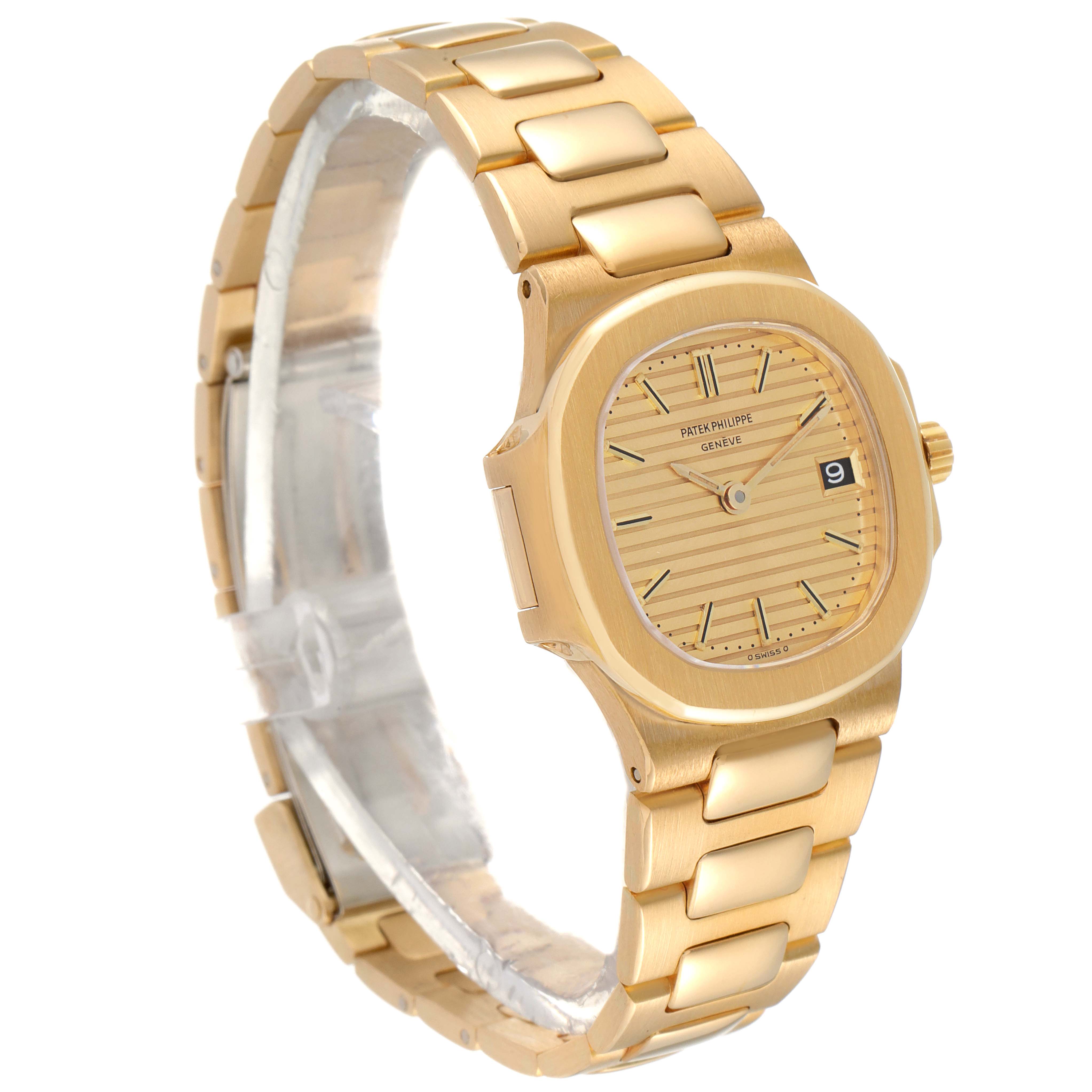 The image shows a side and front angle view of a Patek Philippe Nautilus 4700/1 Women's Yellow Gold Champagne Dial 4700/1 Women's Yellow Gold Champagne Dial watch, highlighting its gold case, bracelet, and dial with date display.