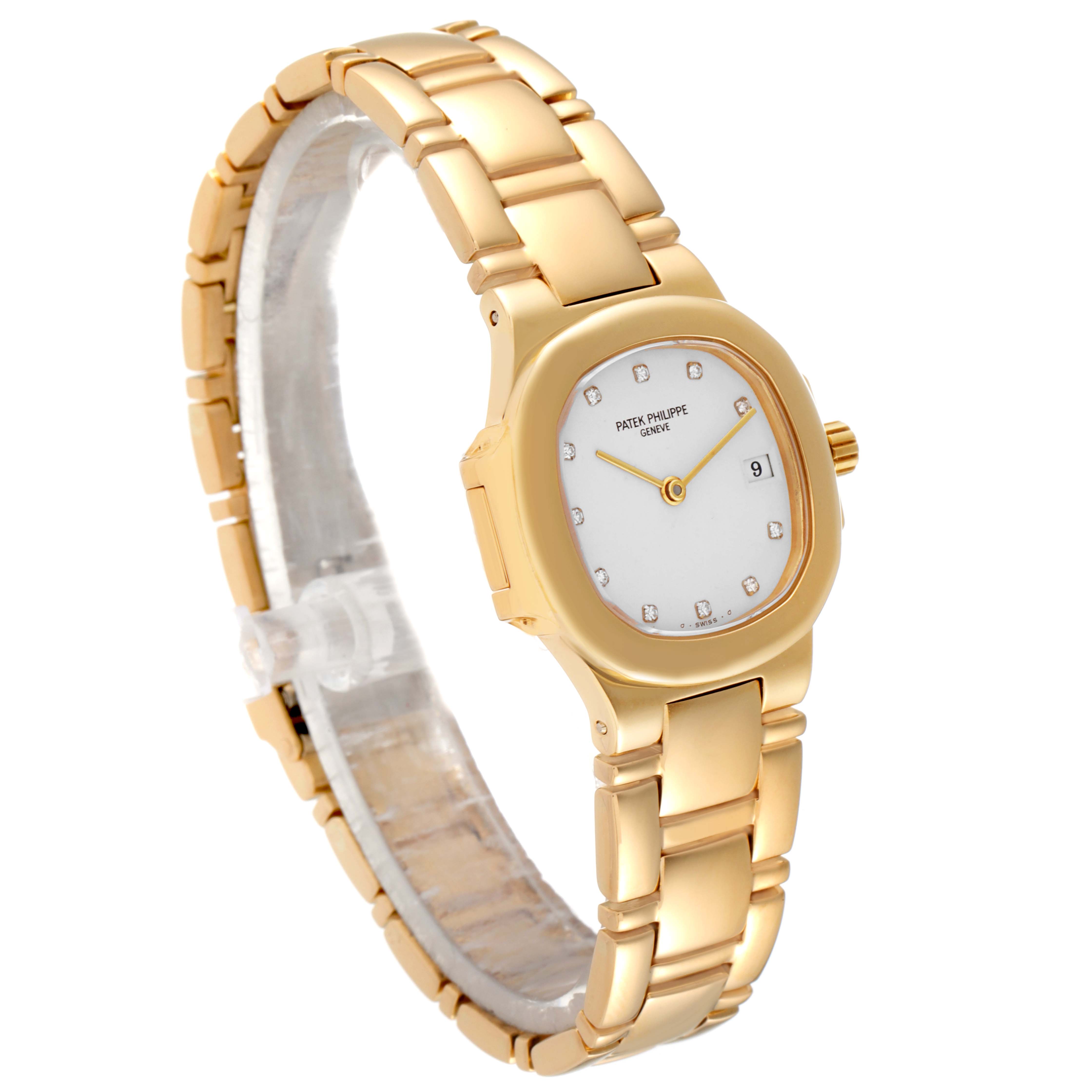 This image shows a side angle of a Patek Philippe Nautilus 4700/1 Women's Yellow Gold Beige Dial 4700/1 Women's Yellow Gold Beige Dial watch, highlighting the gold case, bracelet, and dial.